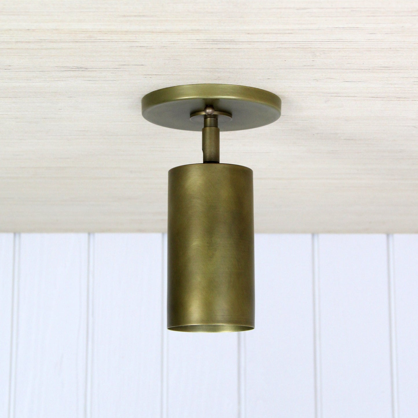 Post Flush Mount Swivel in Aged Satin Brass