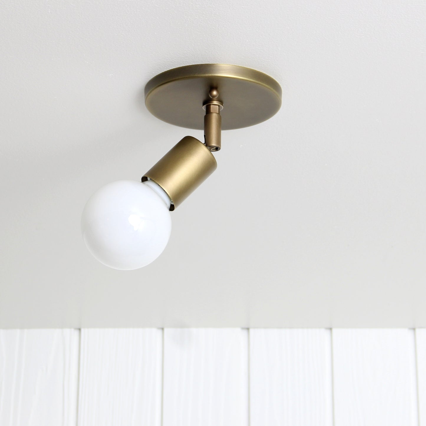 Trek Flush Mount Swivel in Aged Satin Brass