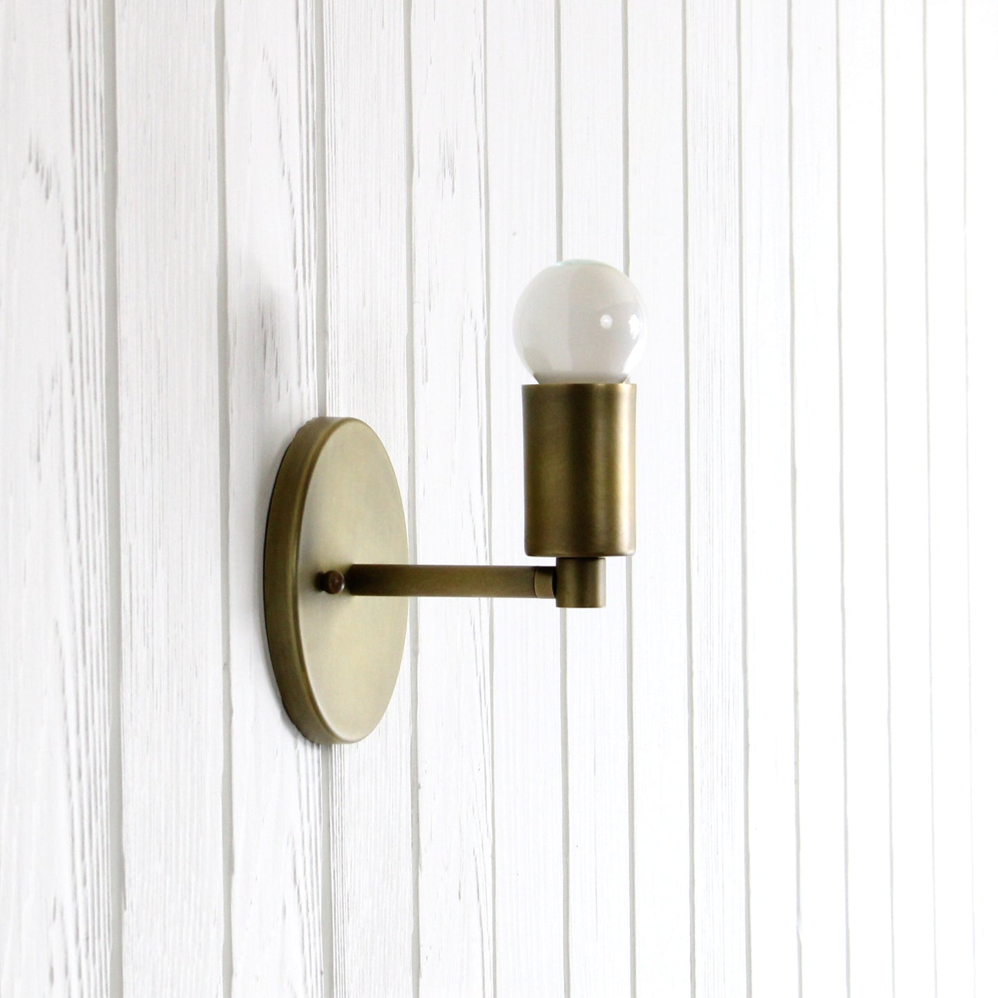 Trek Notch Wall Sconce in Aged Satin Brass