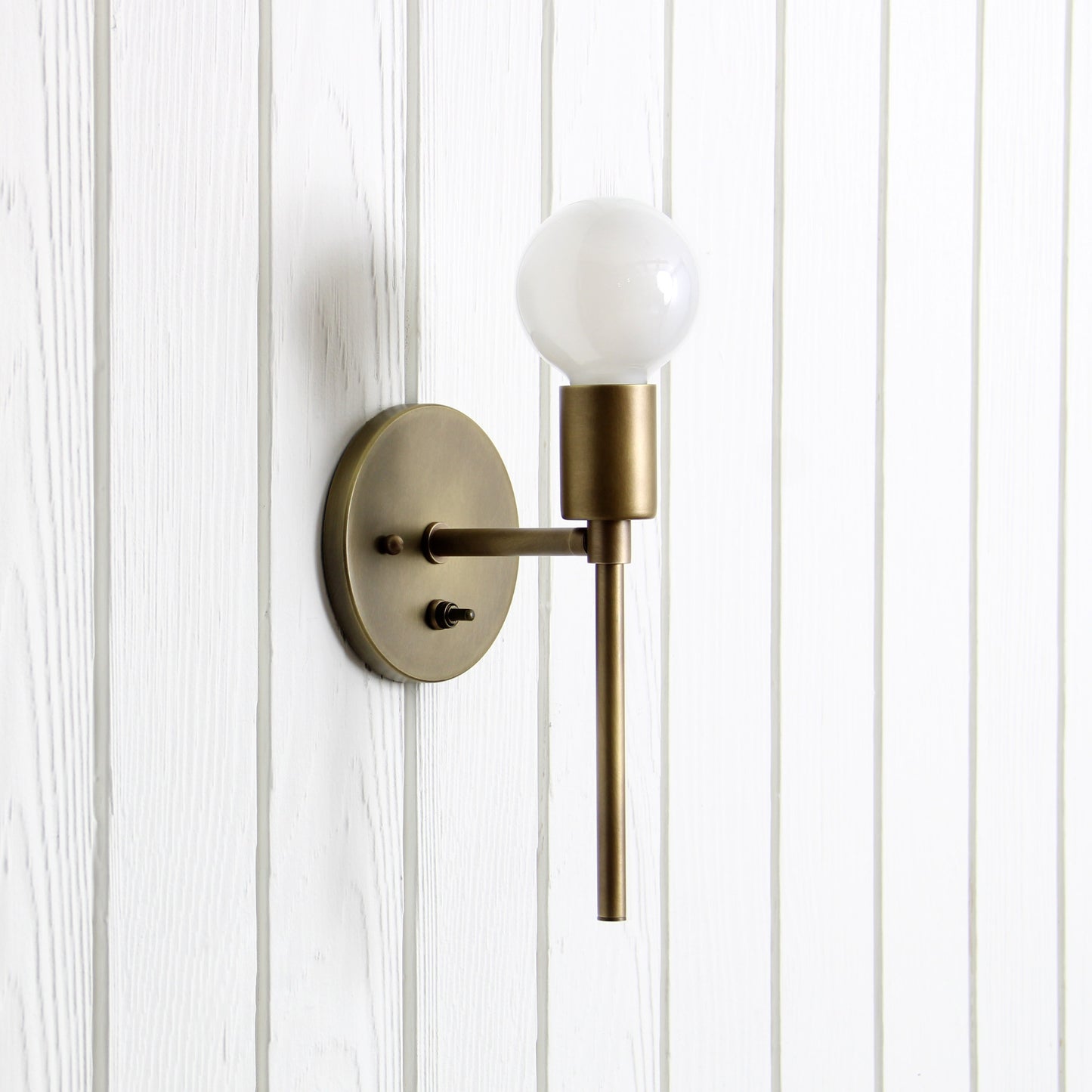 Trek Torch Wall Sconce in Aged Satin Brass w/switch