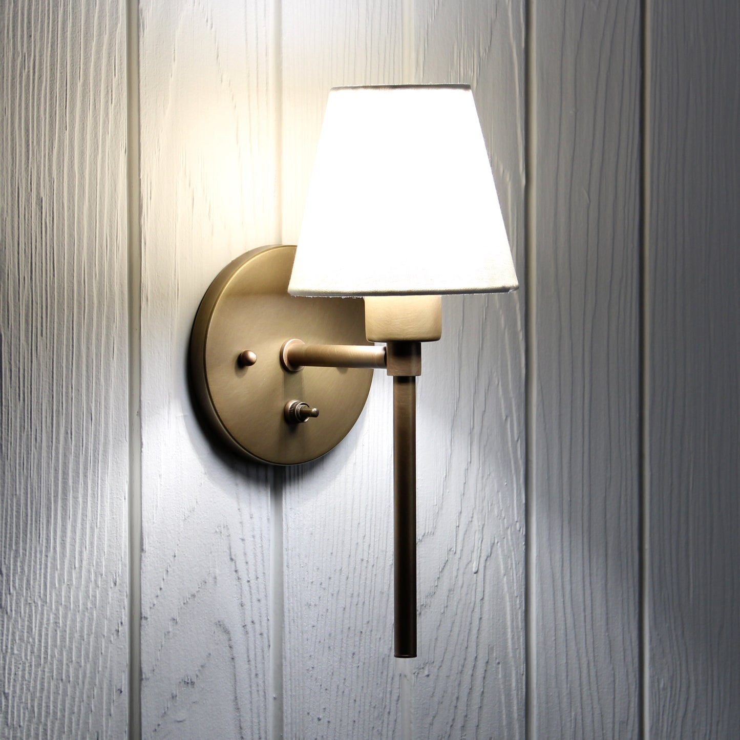 Trek Torch Wall Sconce in Aged Satin Brass w/switch