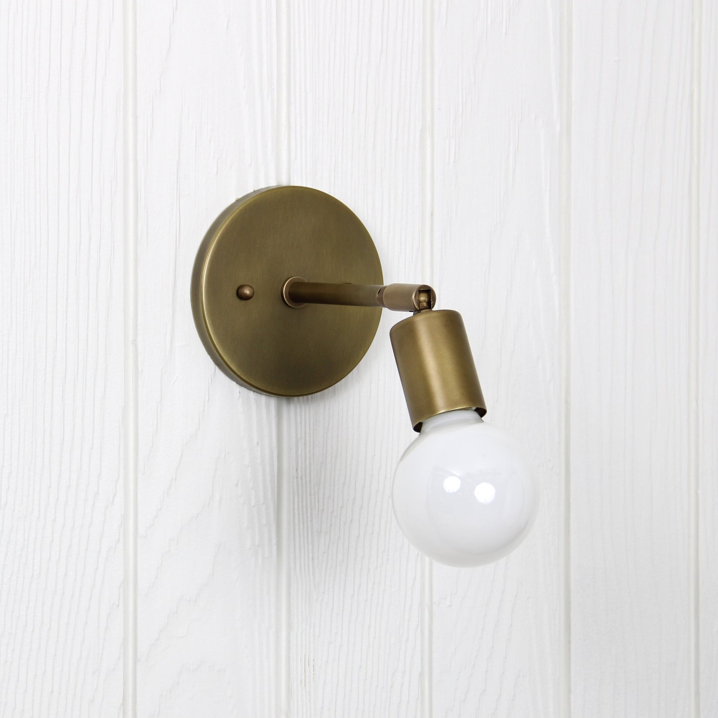 Trek Wall Sconce in Aged Satin Brass