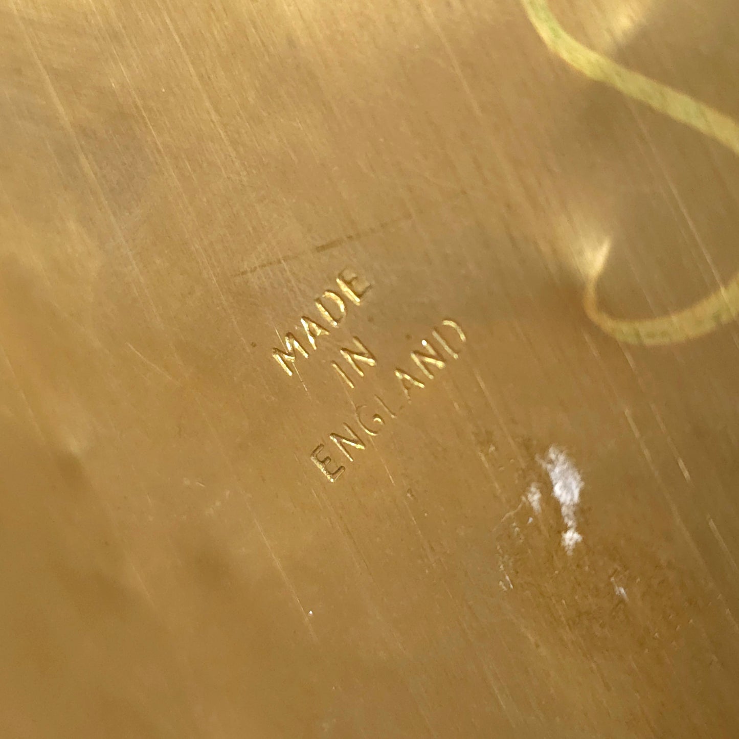 Signature detail of Vintage English Brass Embossed Relief Umbrella Cane Stand