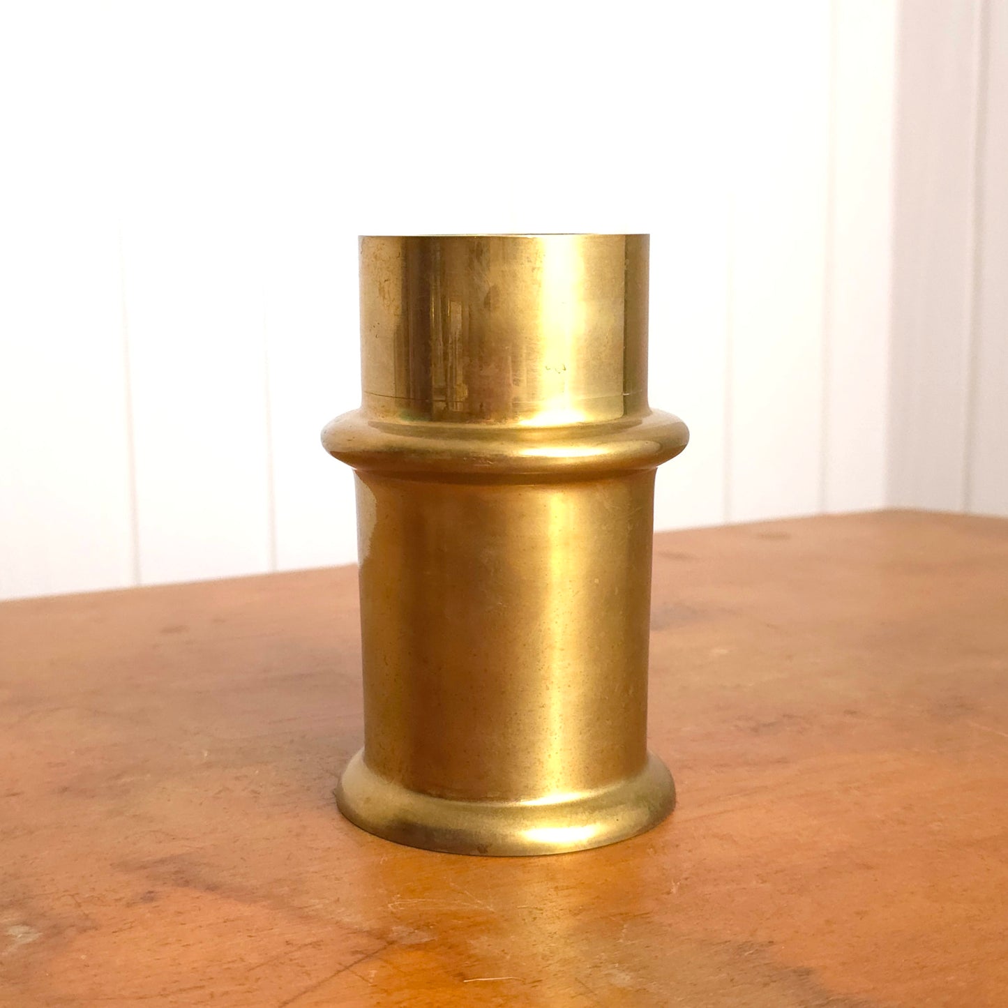 Stout brass segmented cylinder candleholder