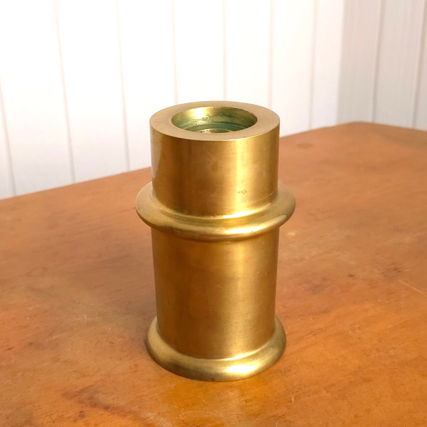 Stout brass segmented cylinder candleholder