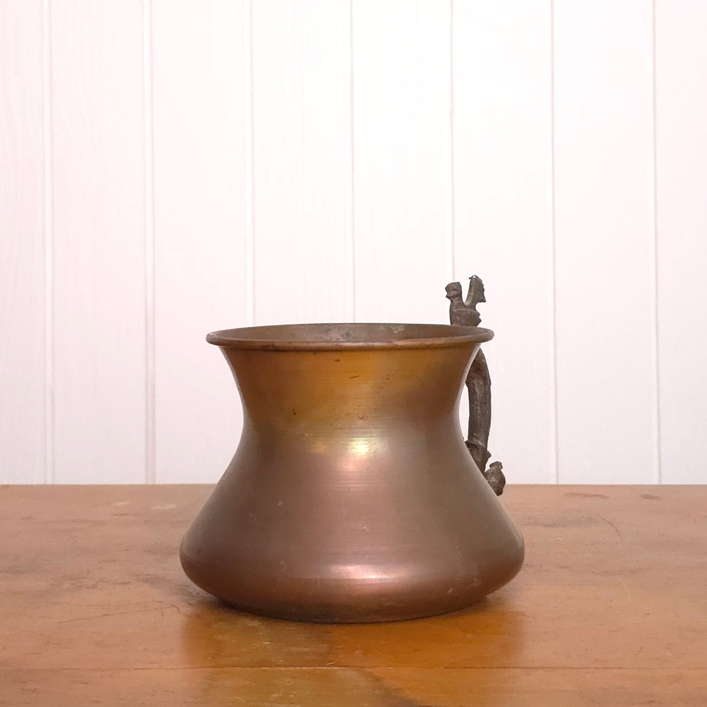 Copper pitcher with brutalist bird handle