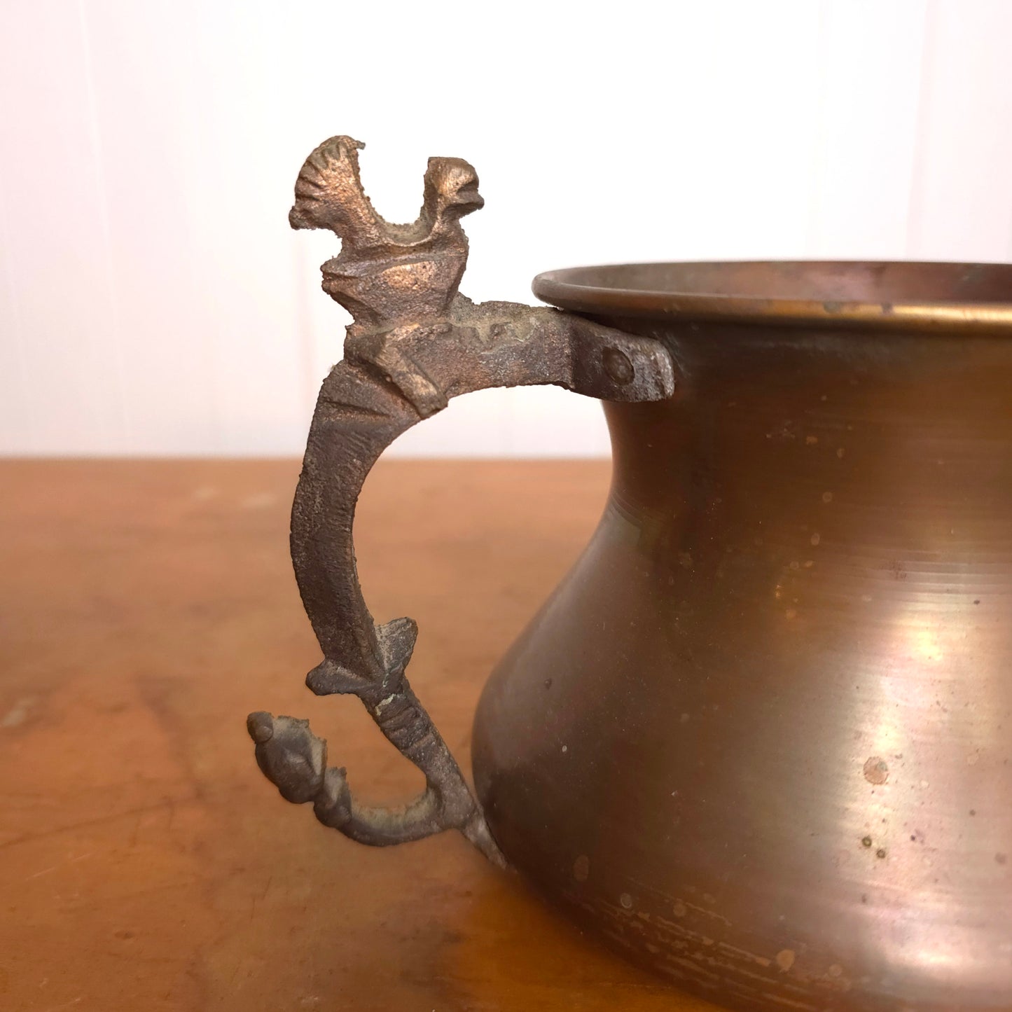 Copper pitcher with brutalist bird handle
