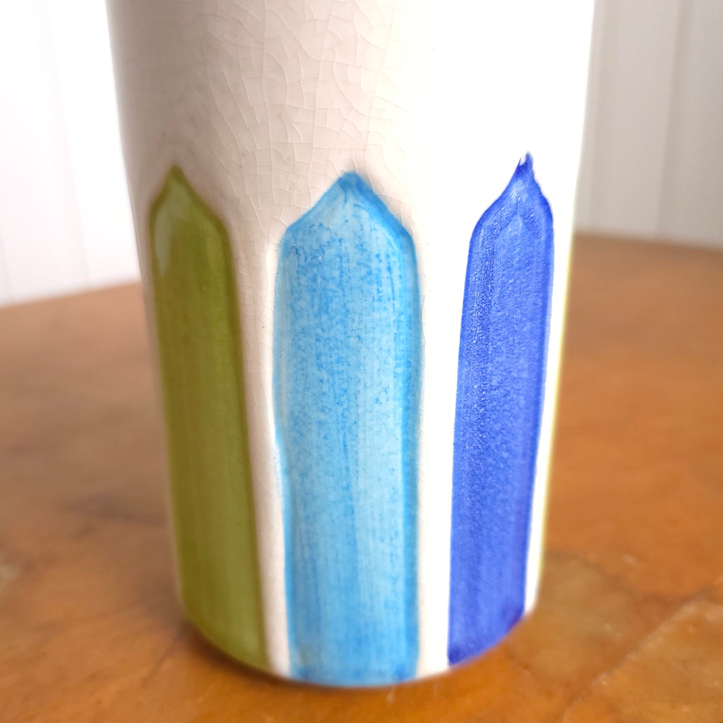 Detail of 1960's Italian white rainbow panel pottery vase