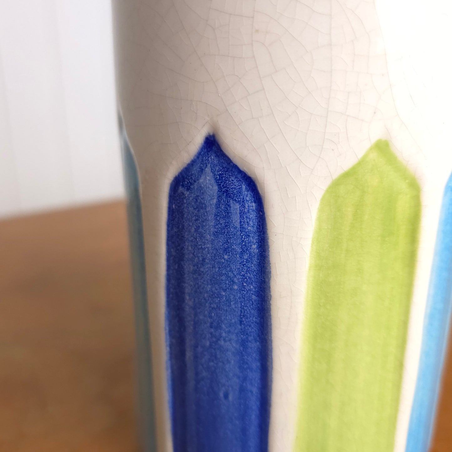 Detail of 1960's Italian white rainbow panel pottery vase