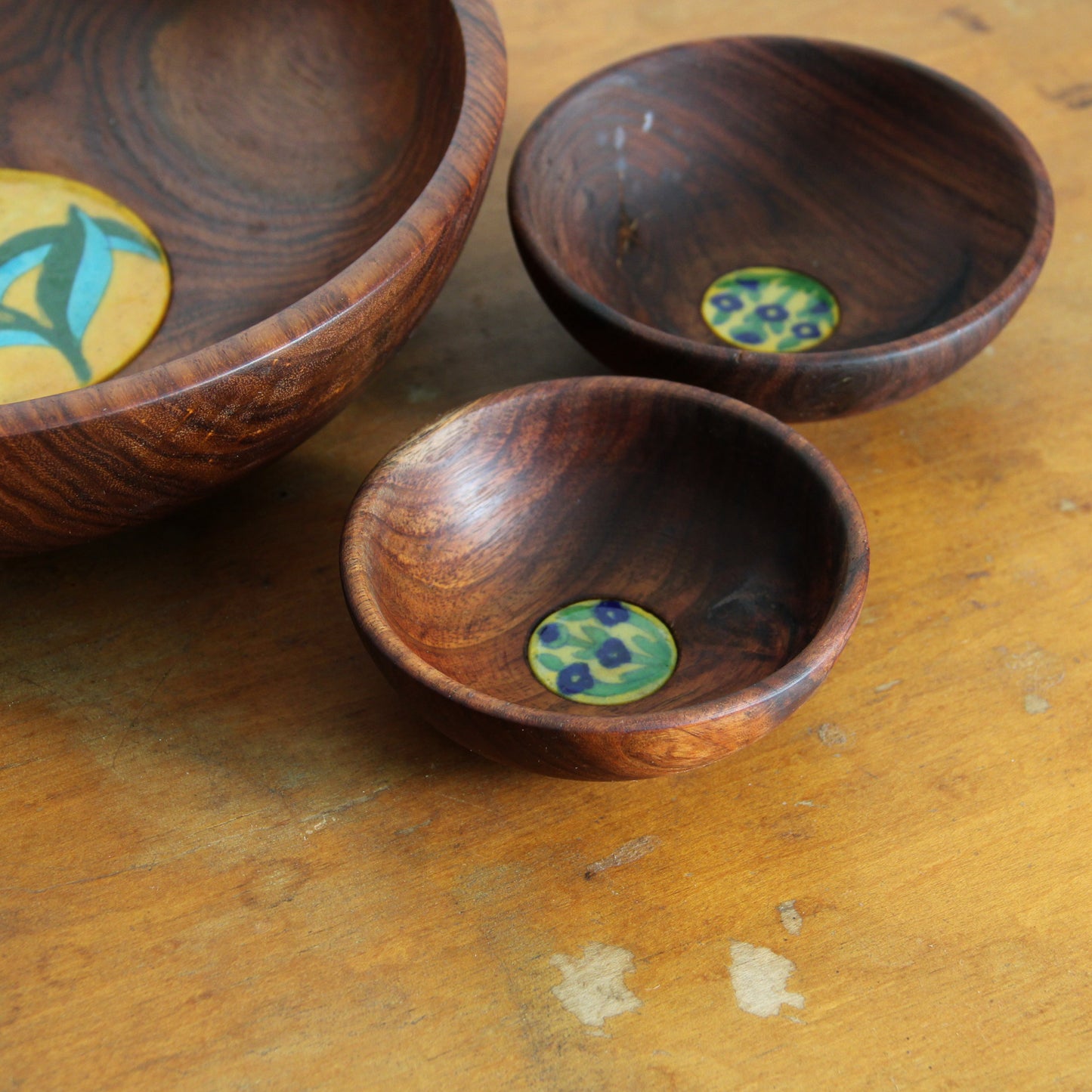 Vintage wooden bowl set with inset floral tiles