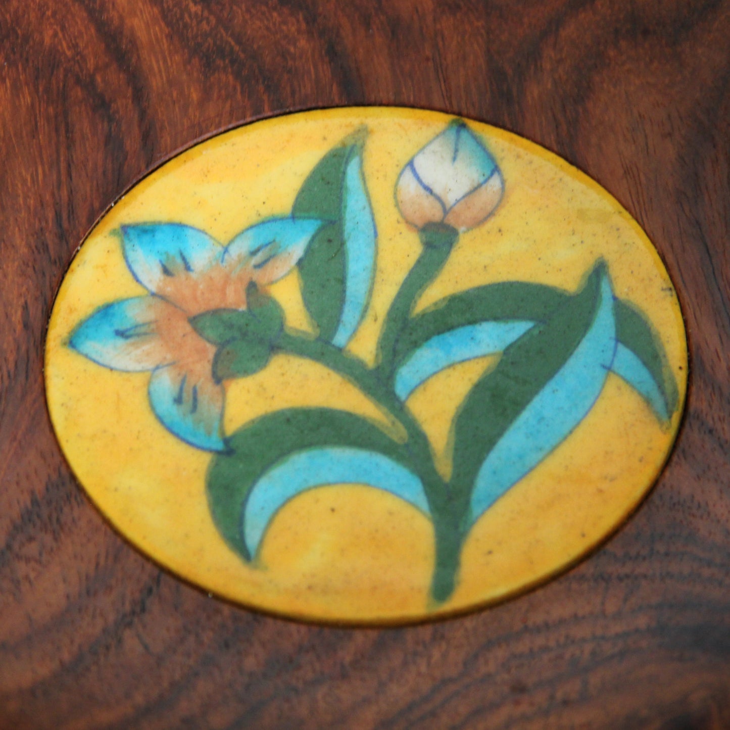 Vintage wooden bowl with inset floral tile