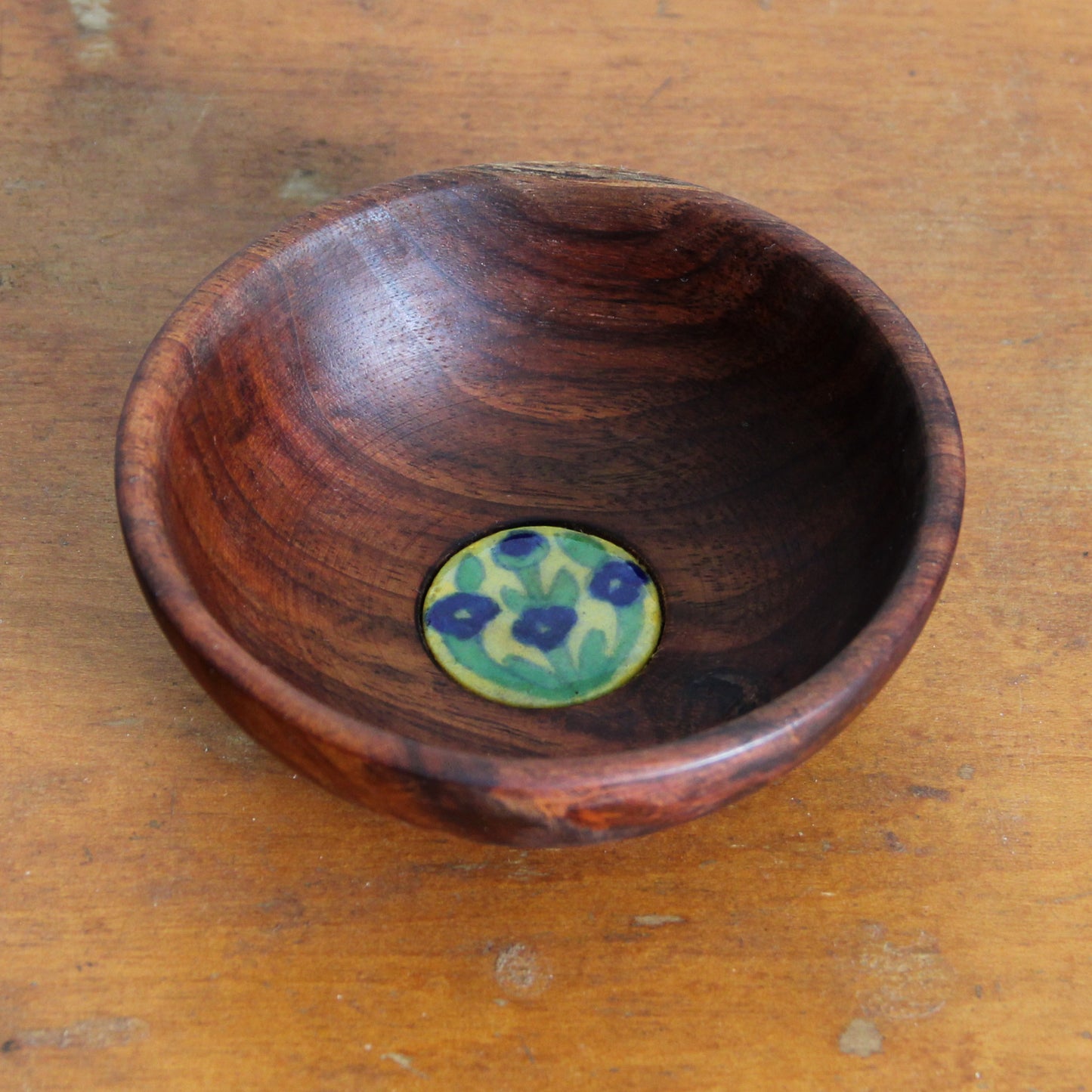 Vintage wooden bowl with inset floral tile