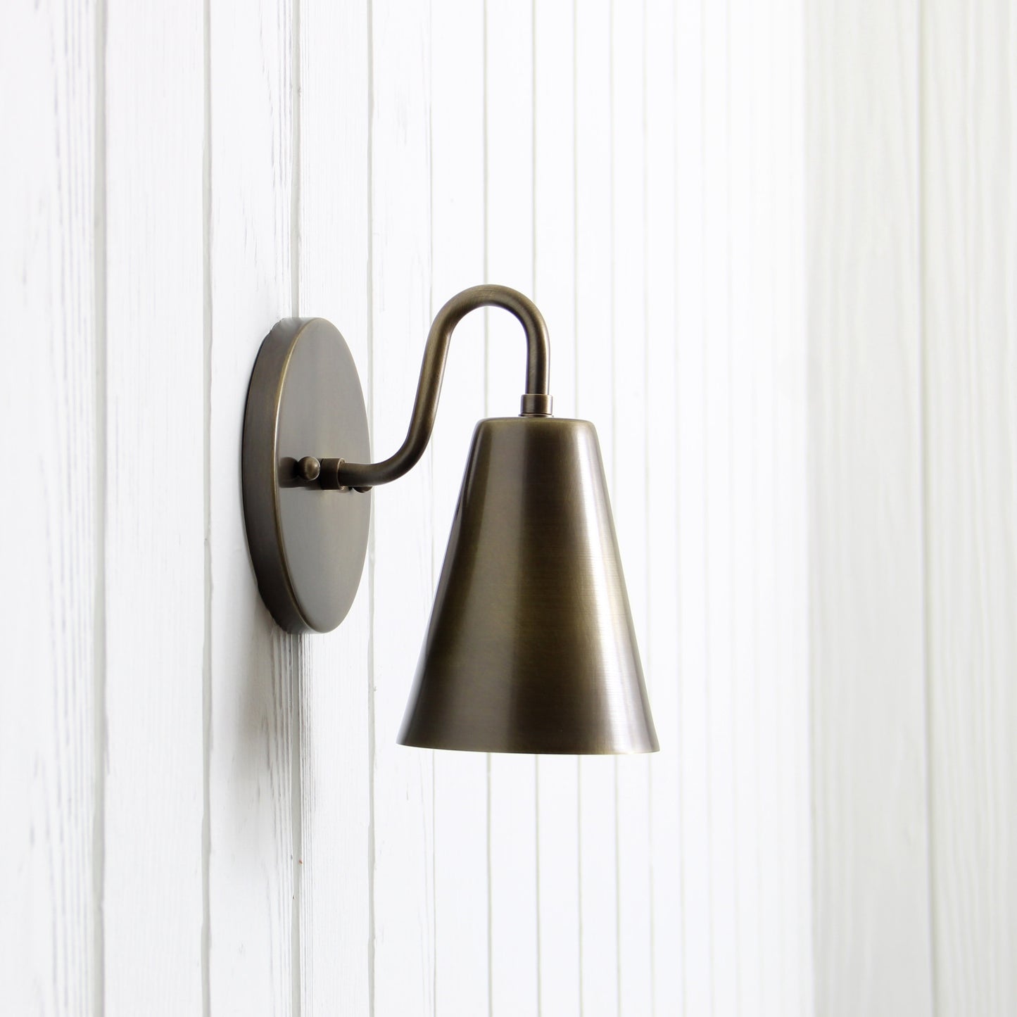 Crook Wall Sconce in Antique Brass