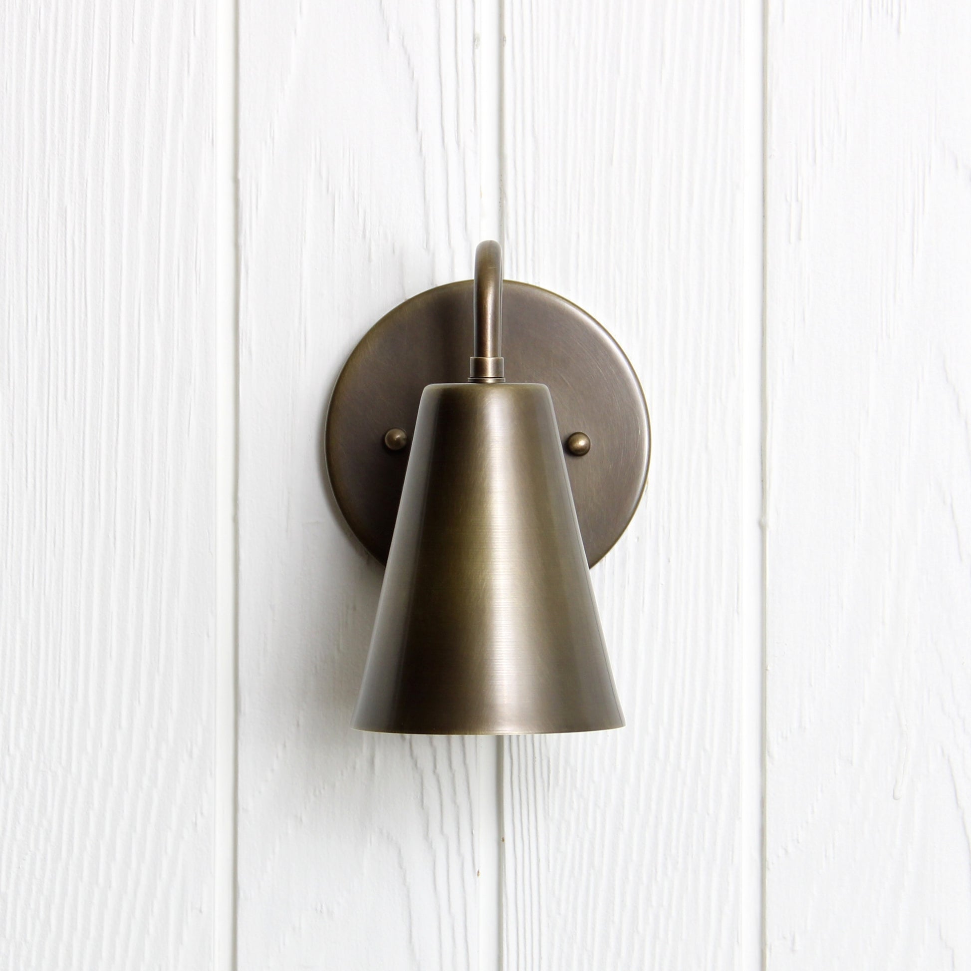Crook Wall Sconce in Antique Brass