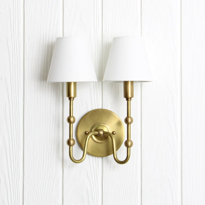 Oyère Dual Wall Sconce in Heritage Brass