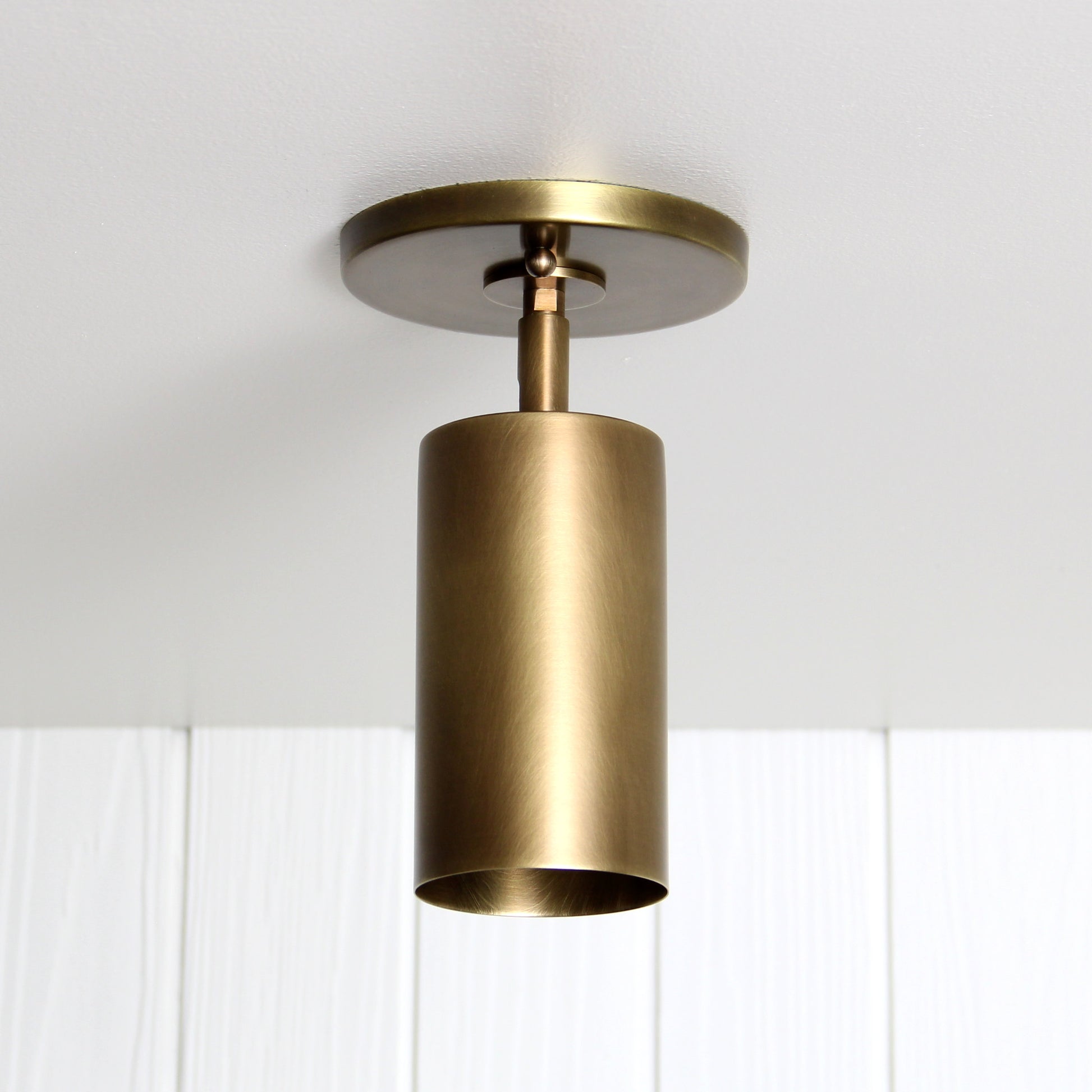 Post Flush Mount Swivel in Aged Brass