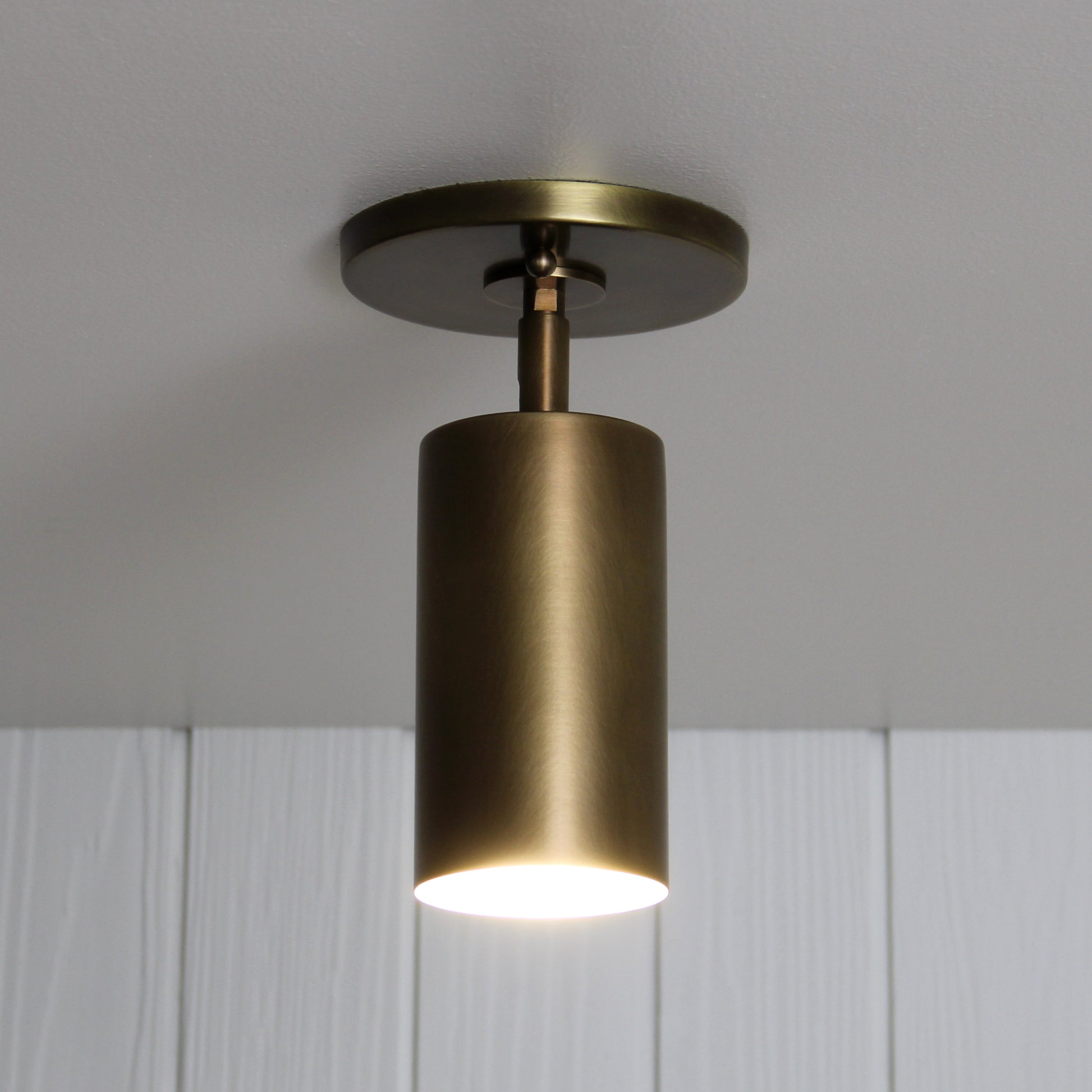 Post Flush Mount Swivel in Aged Brass