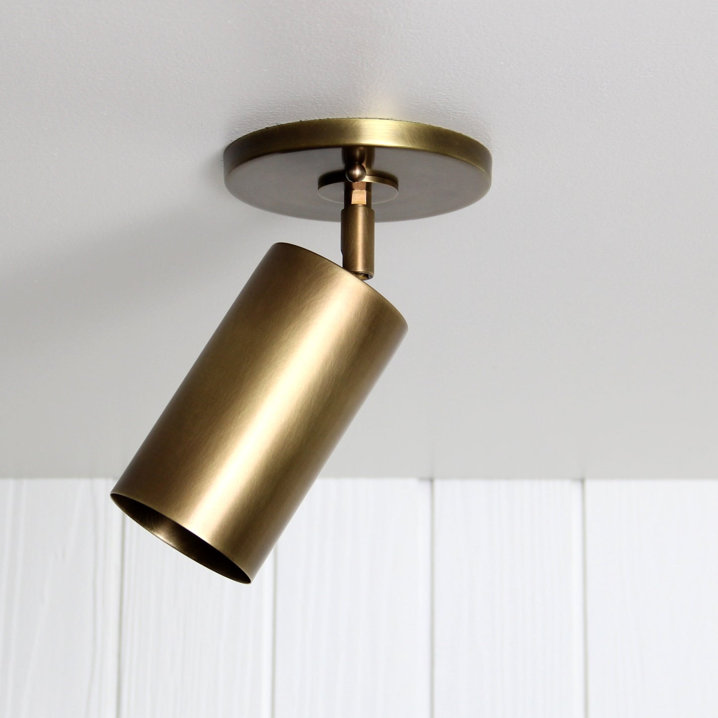 Post Flush Mount Swivel in Aged Brass