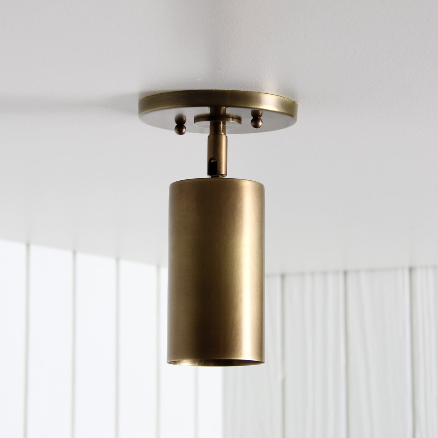 Post Flush Mount Swivel in Aged Brass