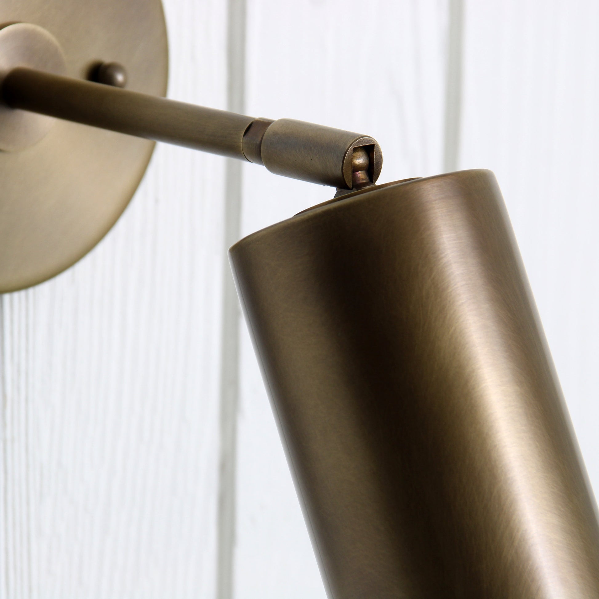 Post Wall Sconce in Aged Brass