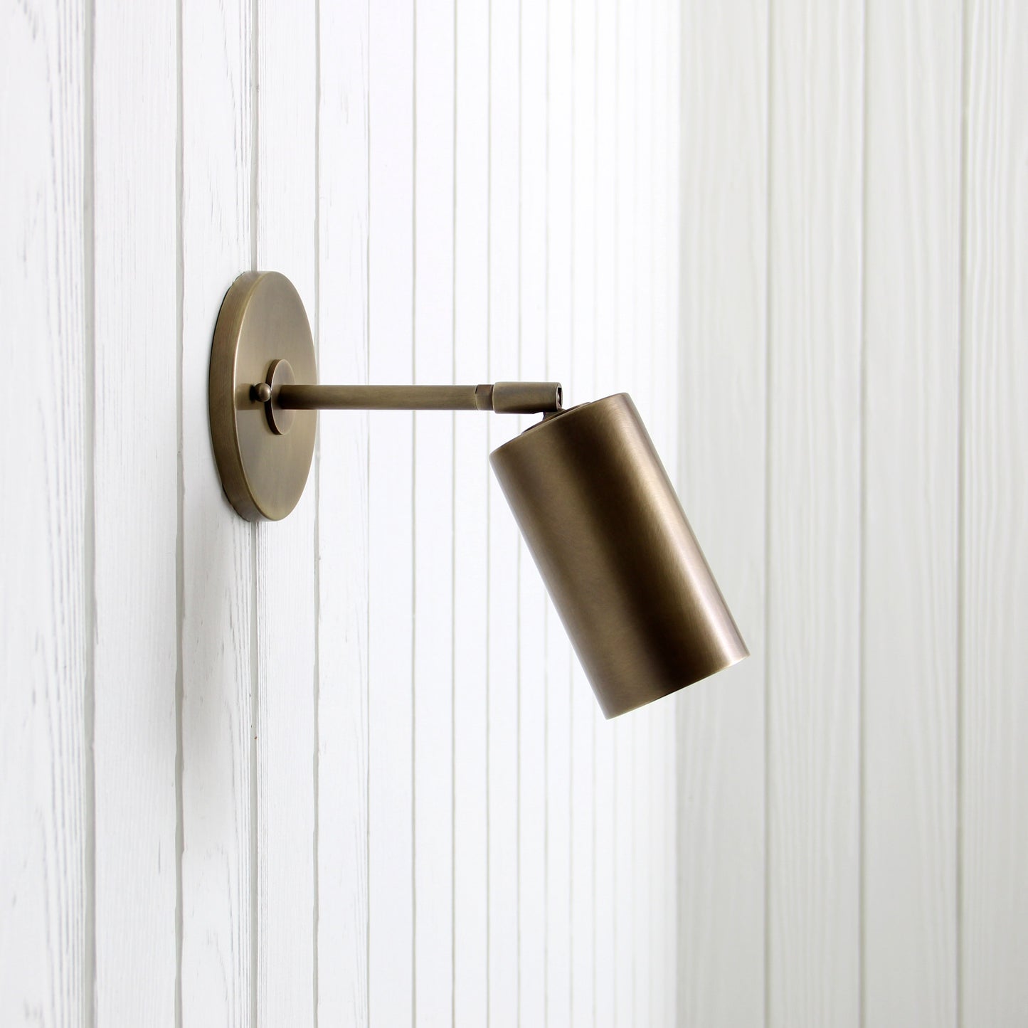 Post Wall Sconce in Aged Brass