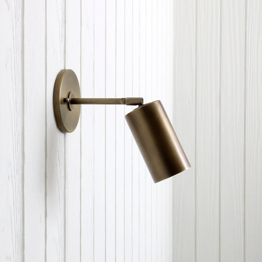 Post Wall Sconce in Aged Brass