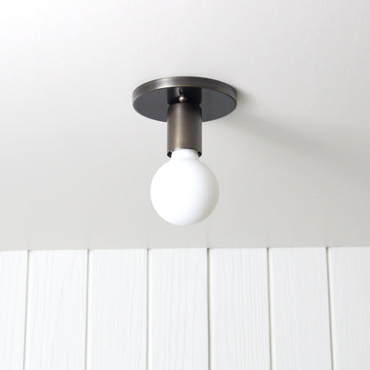 Trek Flush Mount in Antique Brass