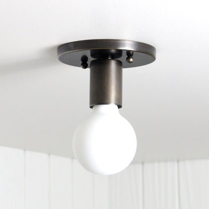Trek Flush Mount in Antique Brass