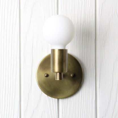 Trek Notch Wall Sconce in Patina Brass