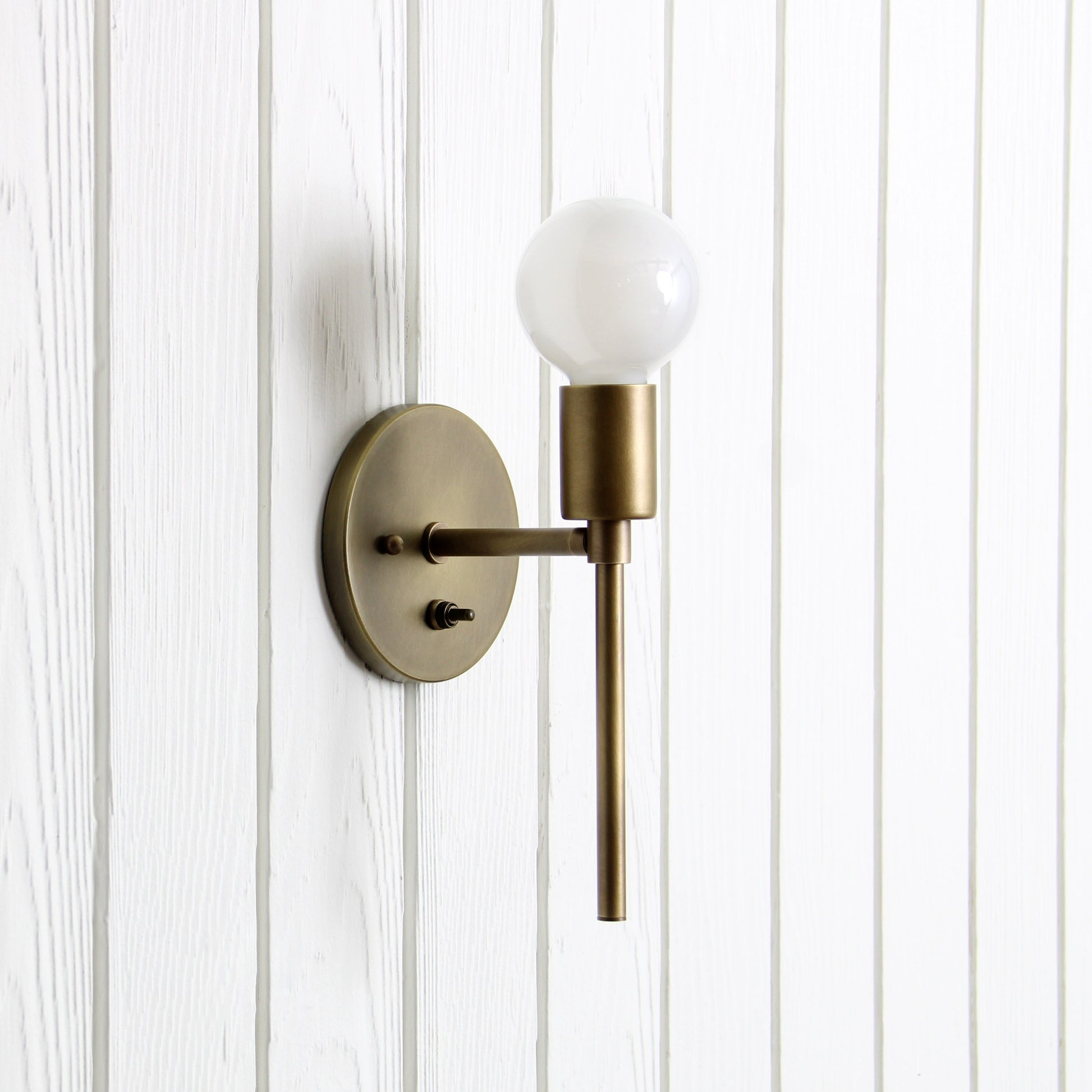 Trek Torch Wall Sconce in Aged Satin Brass w/switch
