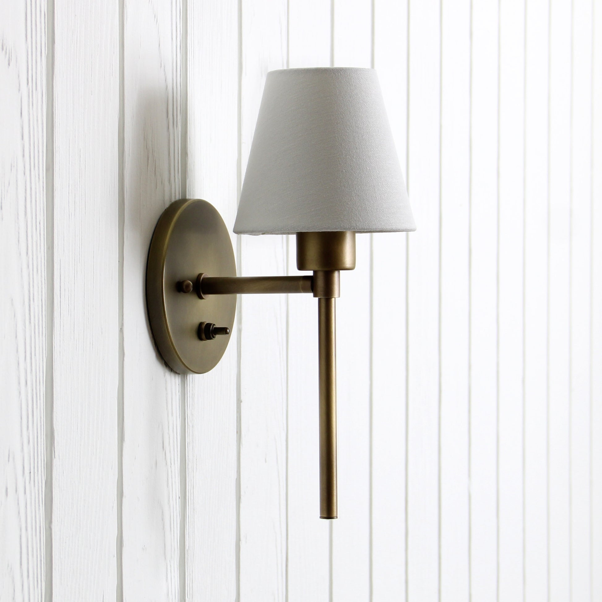 Trek Torch Wall Sconce in Aged Satin Brass w/switch