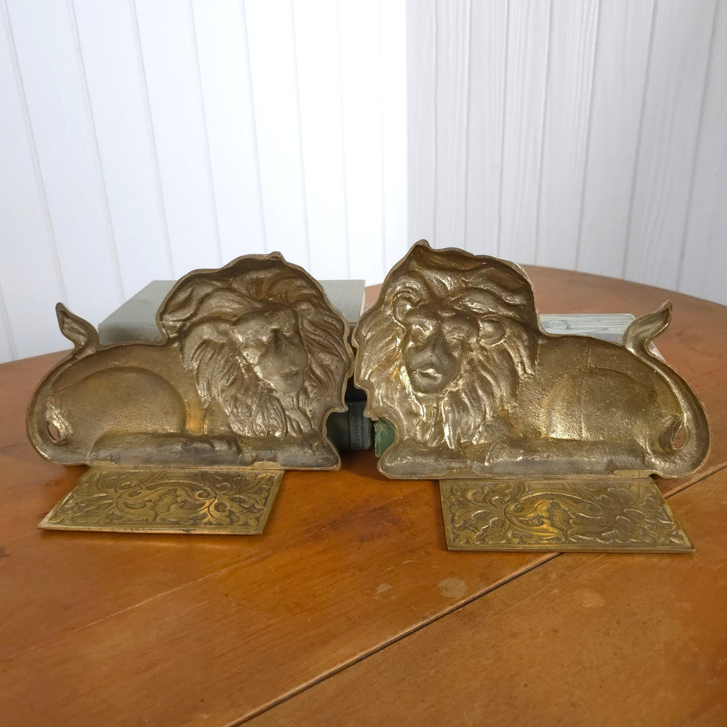 Backsides of Vintage Cast Brass Lion Bookends