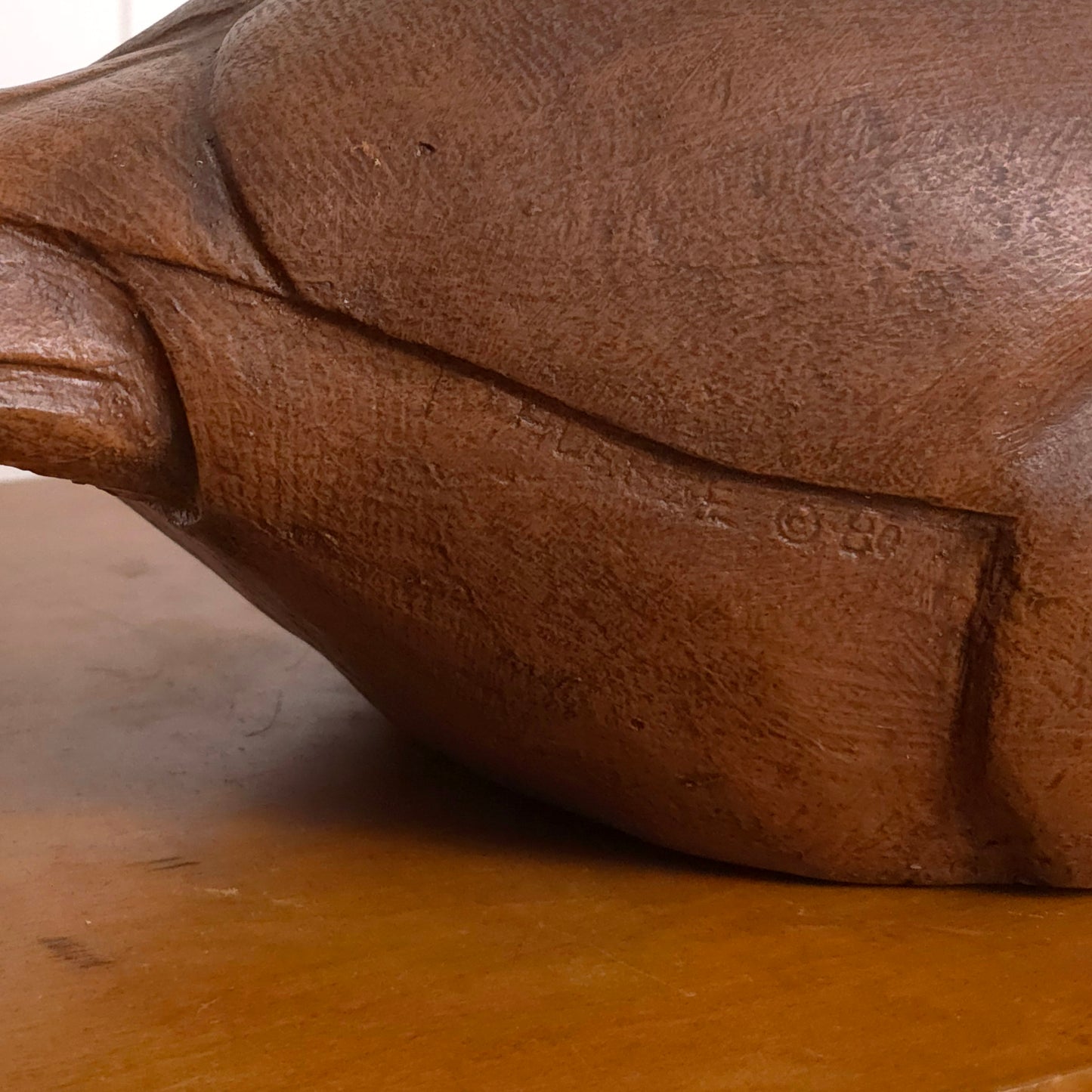 Signature detail of vintage Carl Huff 1980 Resin Carved Swan Decoy