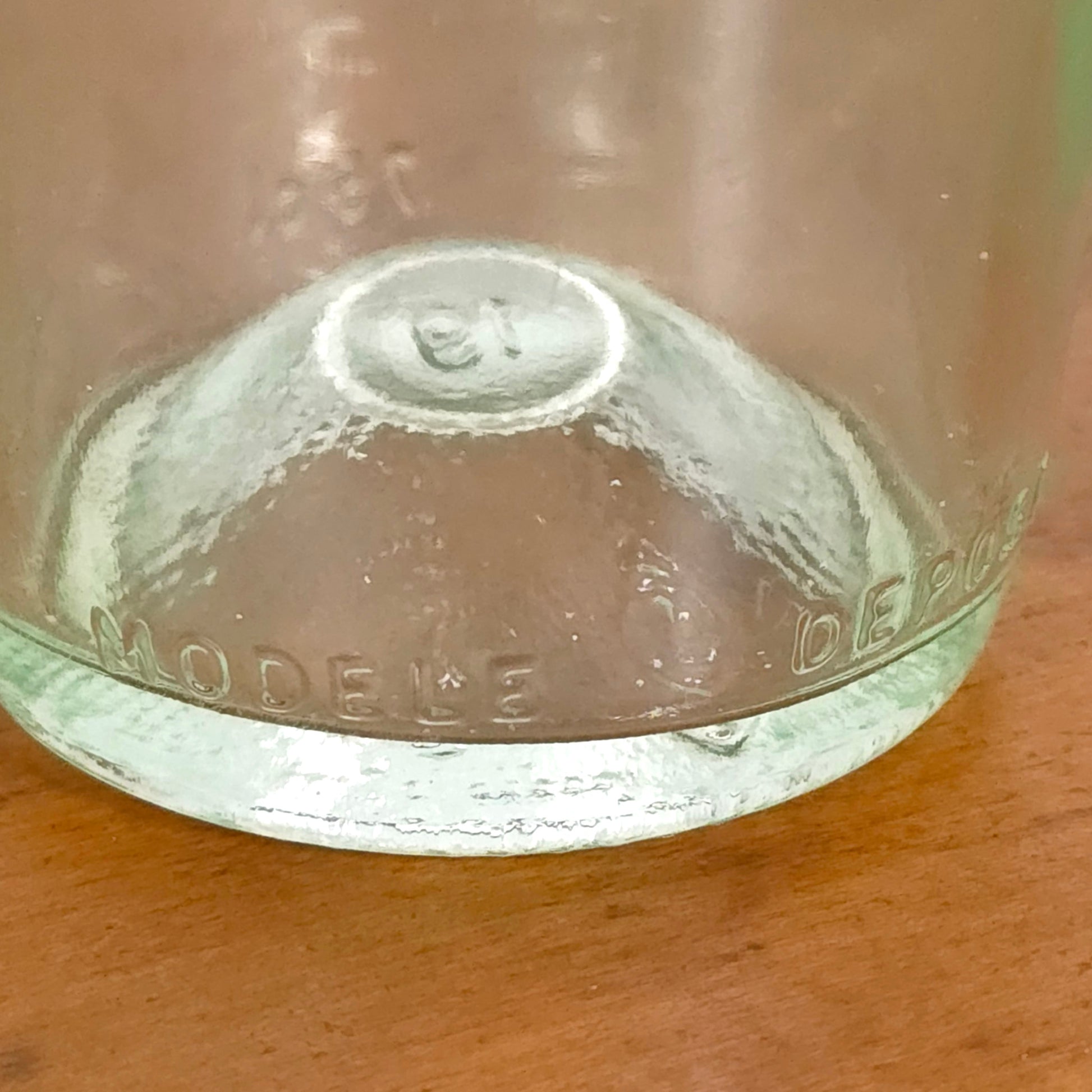 Bottom detail of Vintage French Modele Depose Wine Bottle with Cork