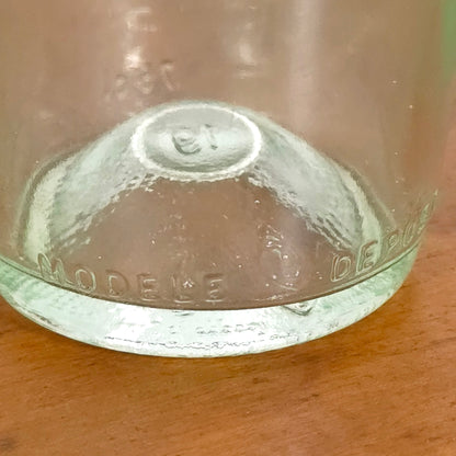 Bottom detail of Vintage French Modele Depose Wine Bottle with Cork
