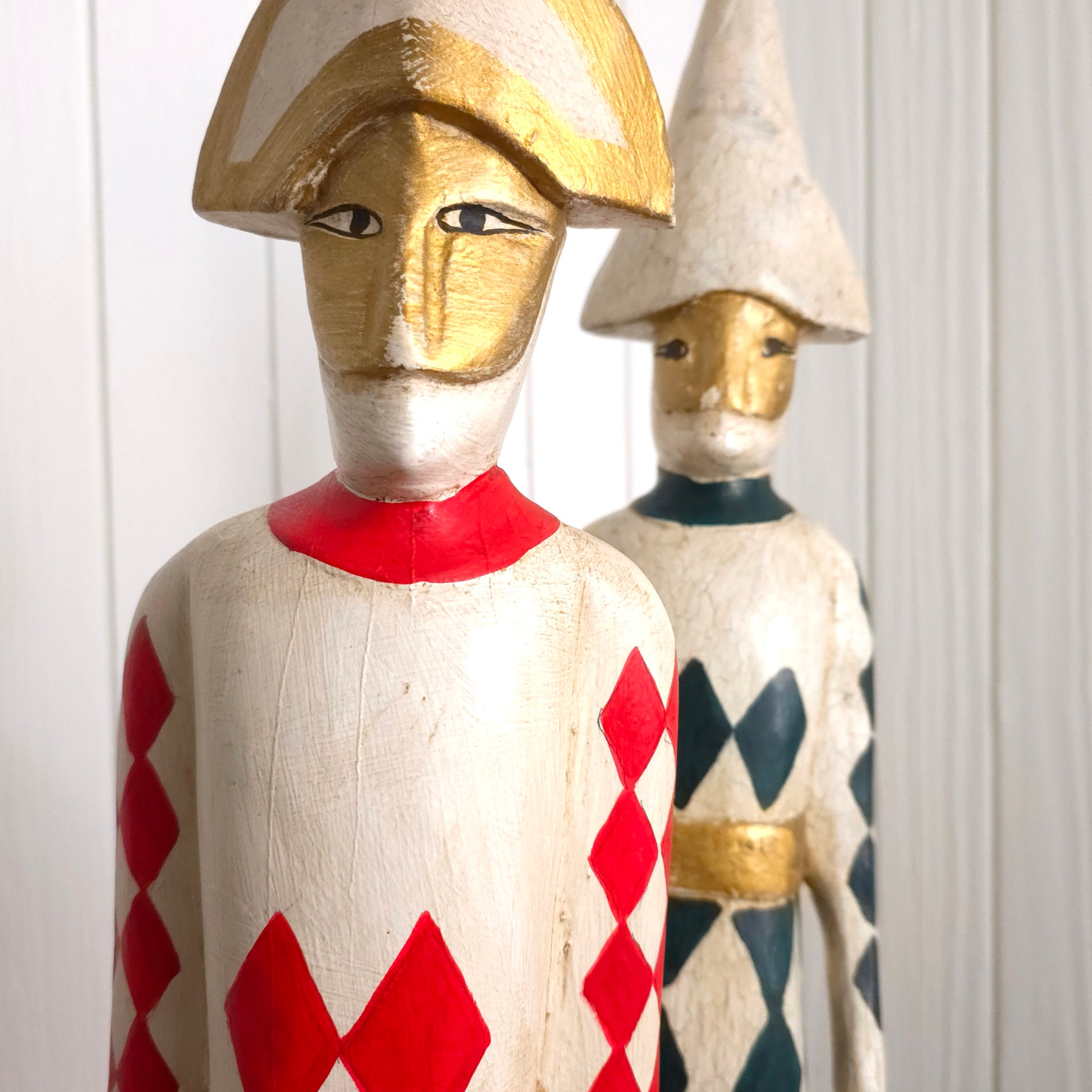 Detail of Italian Harlequin Wooden Jester Statues