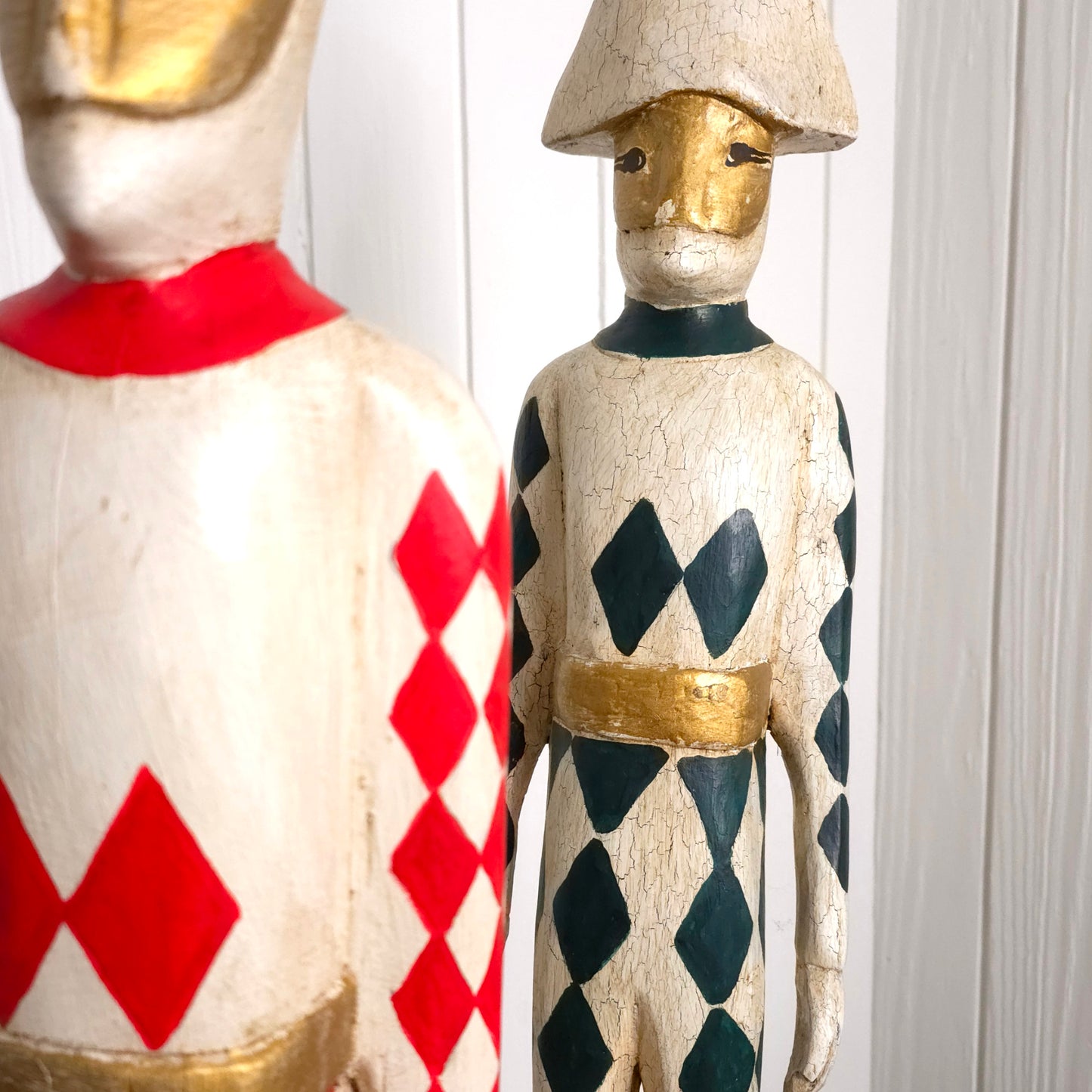 Detail of Italian Harlequin Wooden Jester Statues