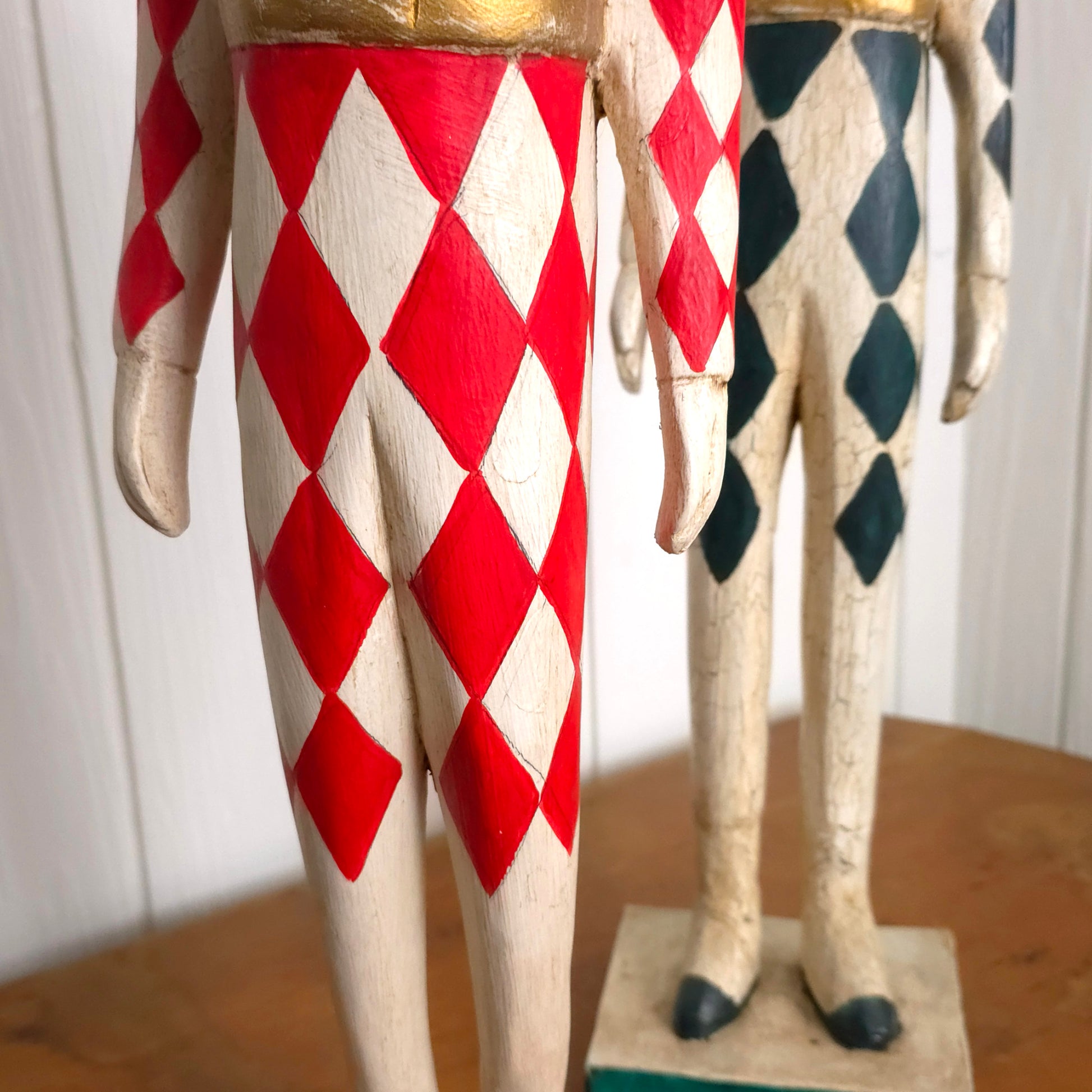 Detail of Italian Harlequin Wooden Jester Statues