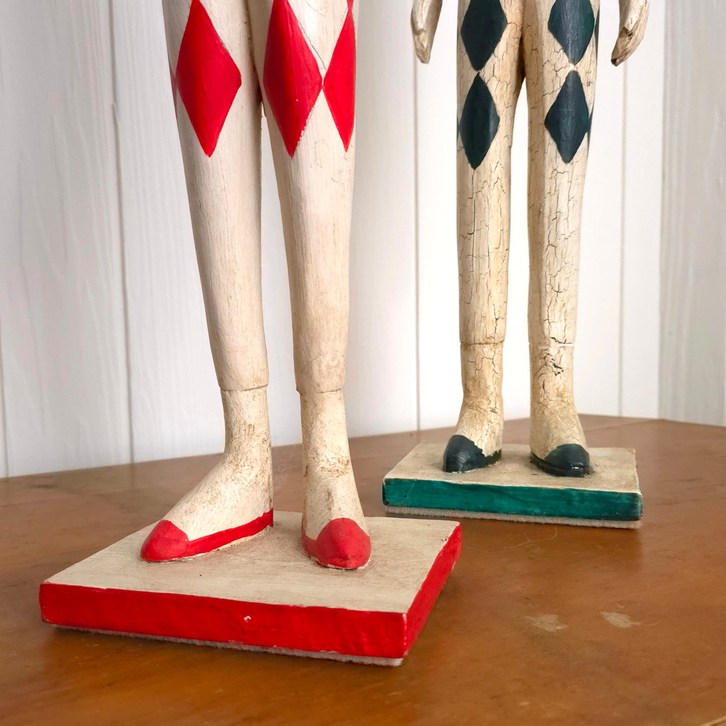 Base detail of Italian Harlequin Wooden Jester Statues