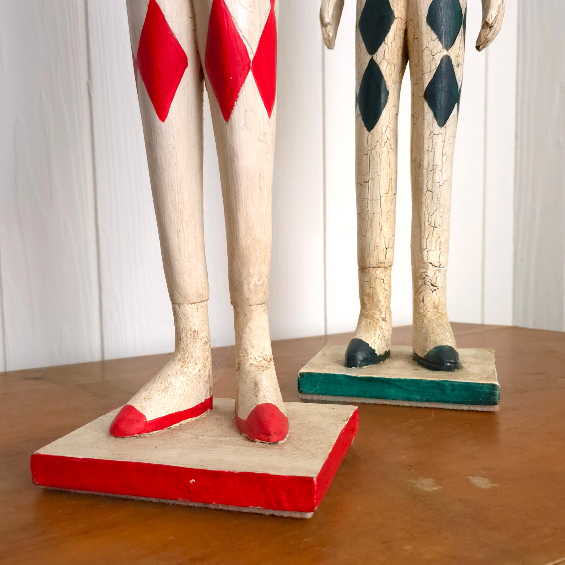 Base detail of Italian Harlequin Wooden Jester Statues