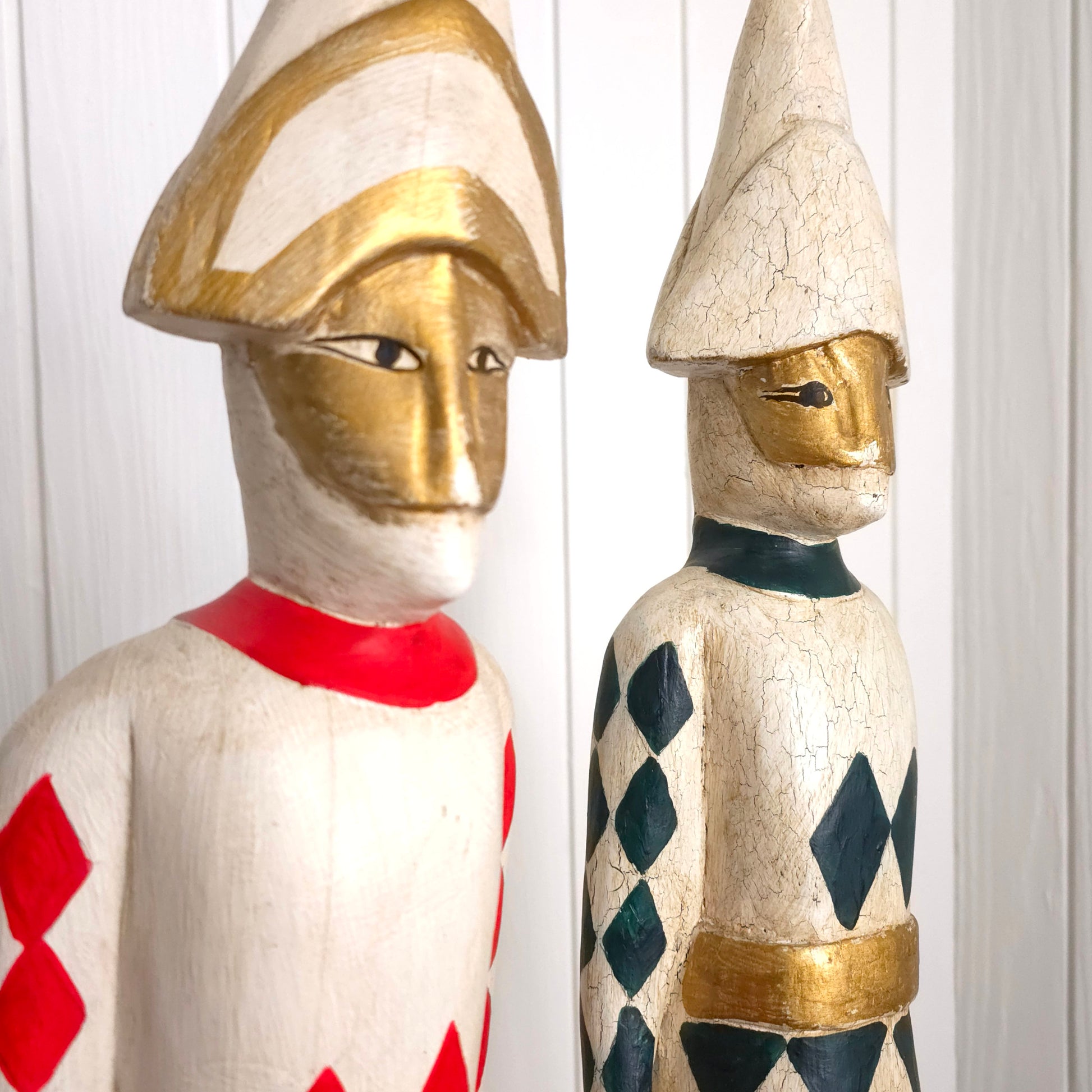 Detail of Italian Harlequin Wooden Jester Statues