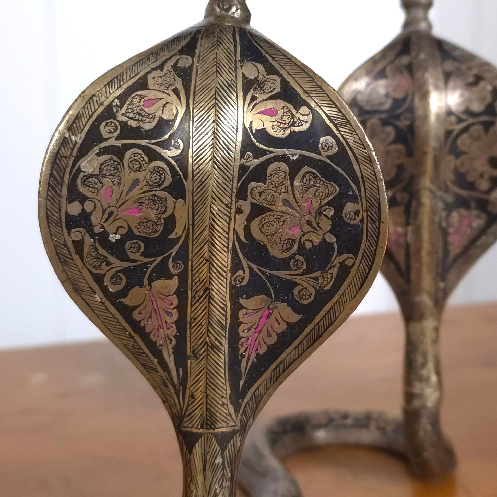 Detail of Vintage Indian Brass Enamel Cobra Snake Candleholders