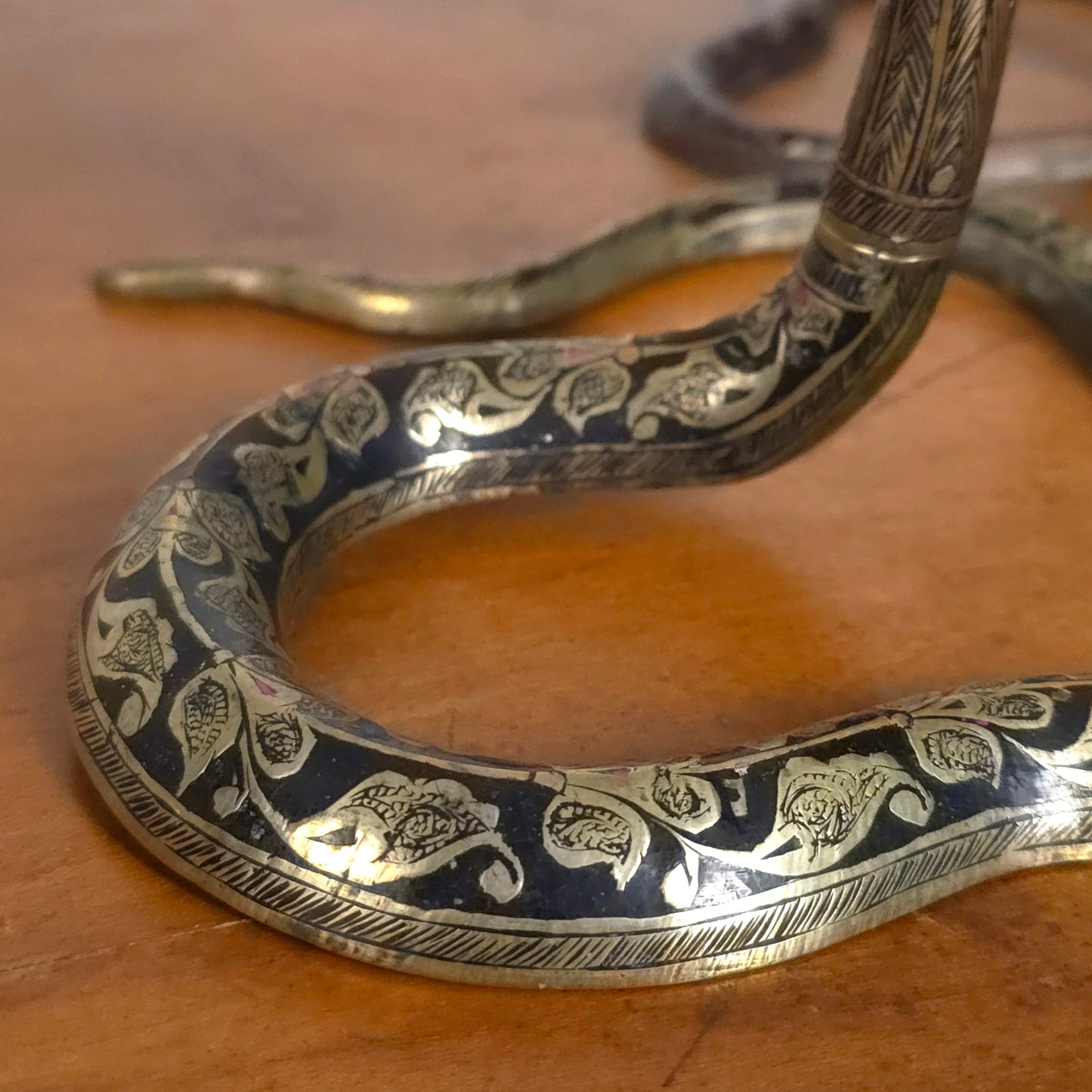 Detail of Vintage Indian Brass Enamel Cobra Snake Candleholders