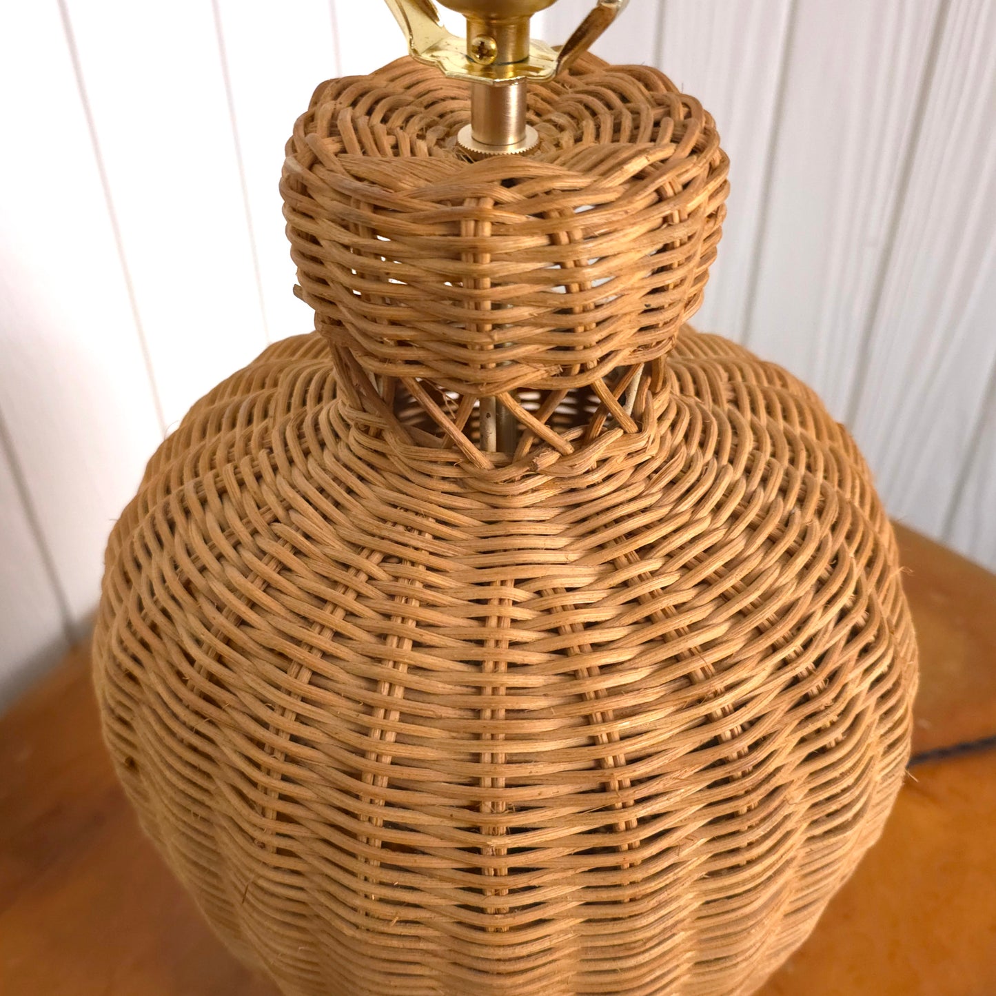 Detail of Vintage Lattice Neck Wicker Basket and Brass Table Lamp