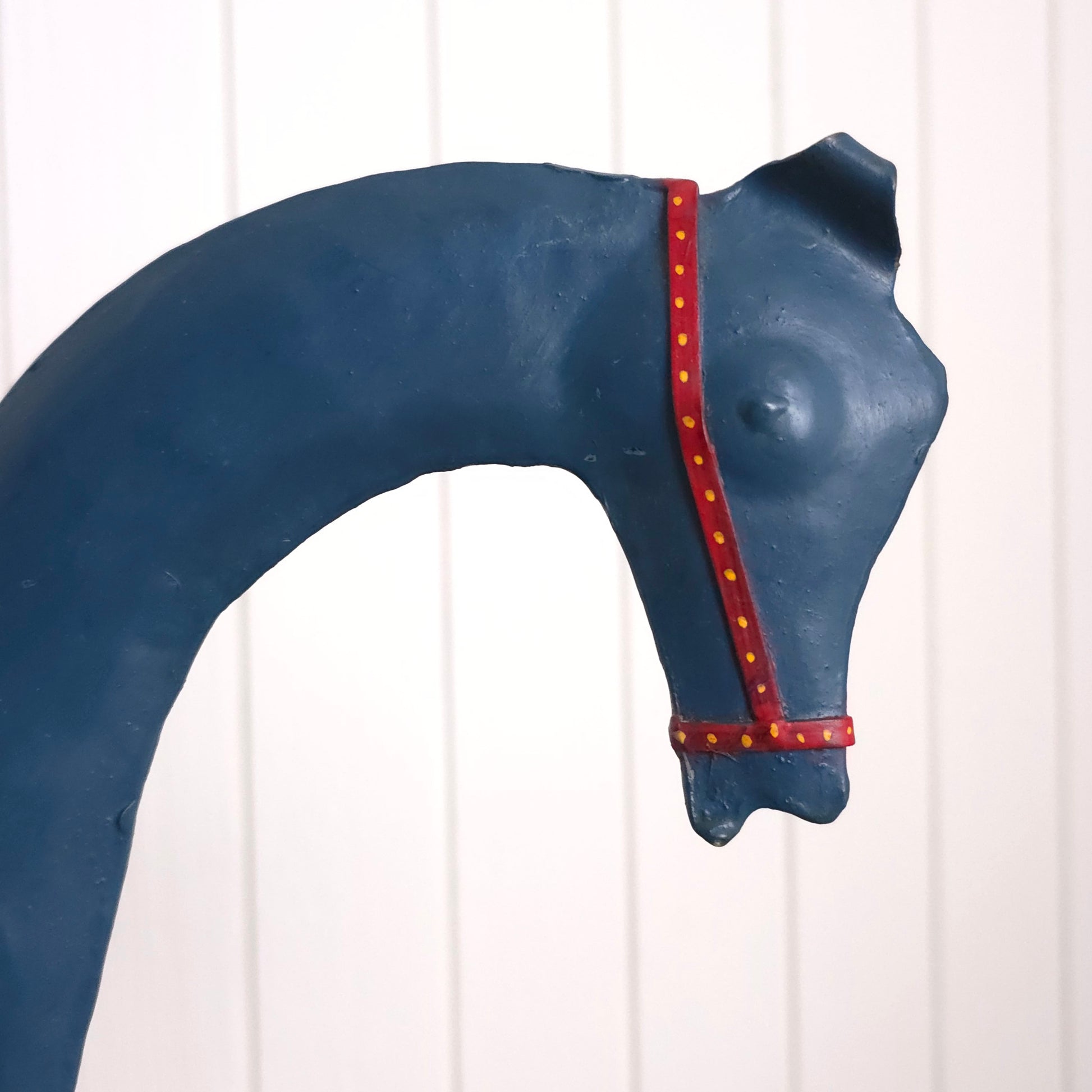 Head detail of Rustic Folk Art Rolling Metal Horse