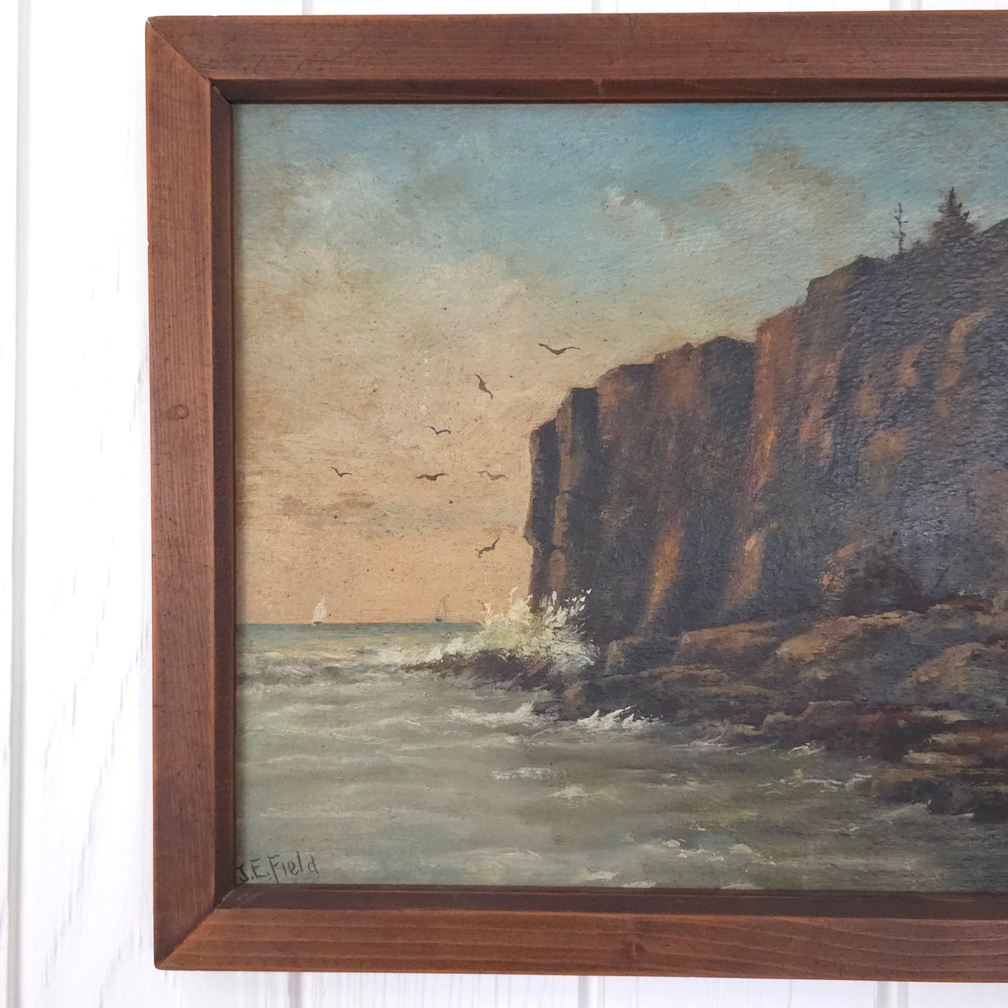 Detail of vintage seaside cliff painting by J.E. Field