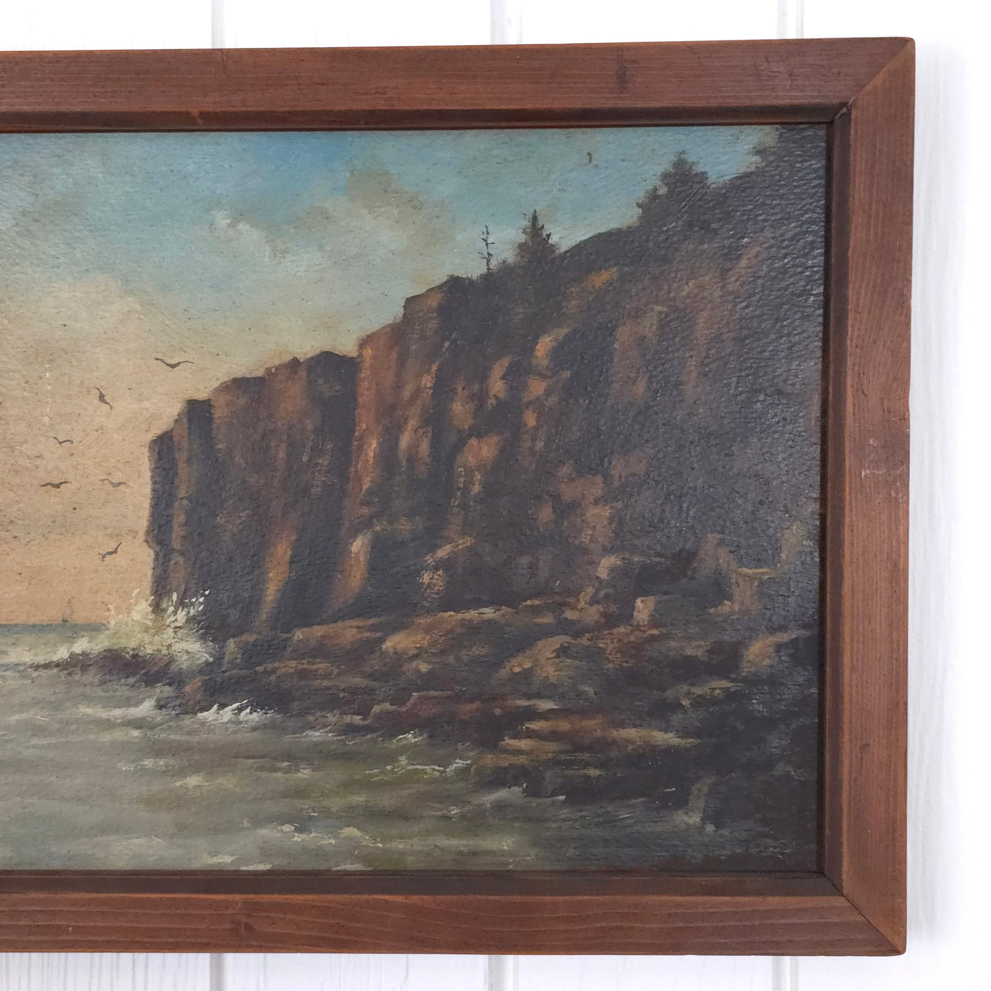 Detail of vintage seaside cliff painting by J.E. Field