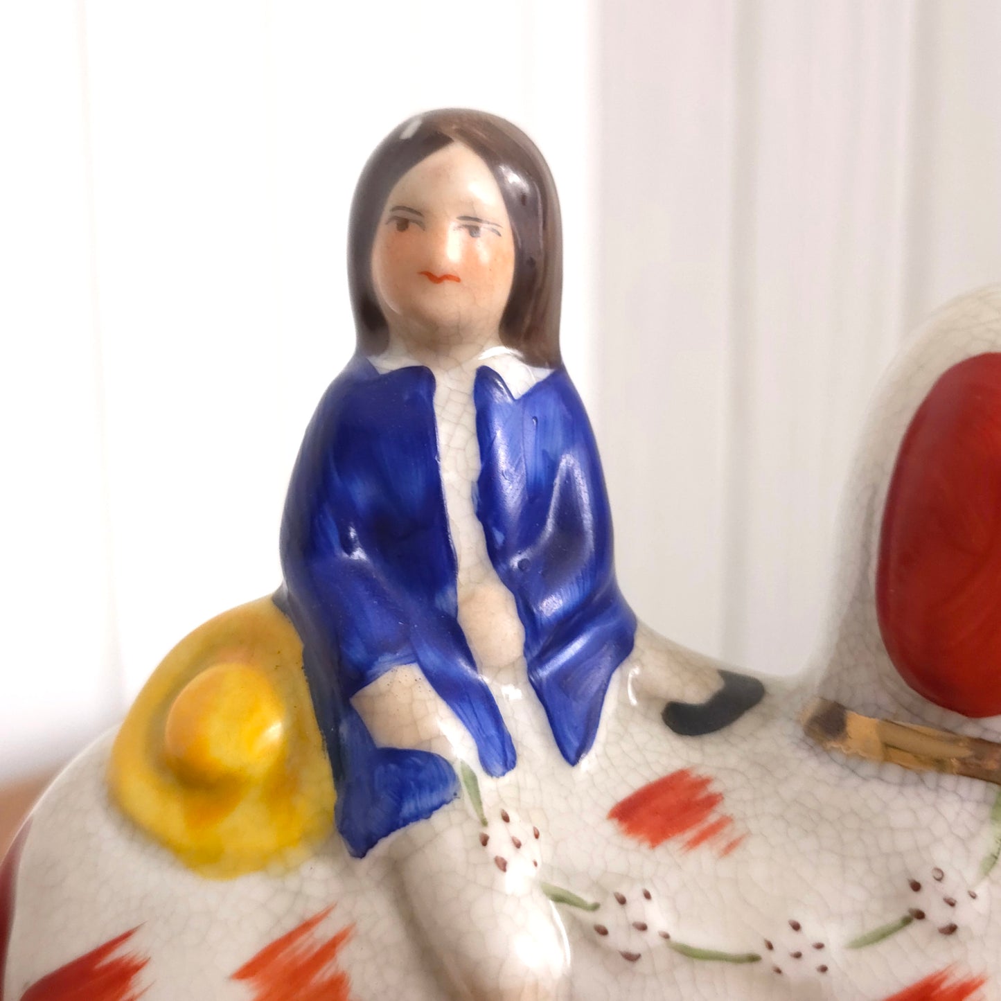 Prince detail of Staffordshire Porcelain Prince and Princess Dog Statues