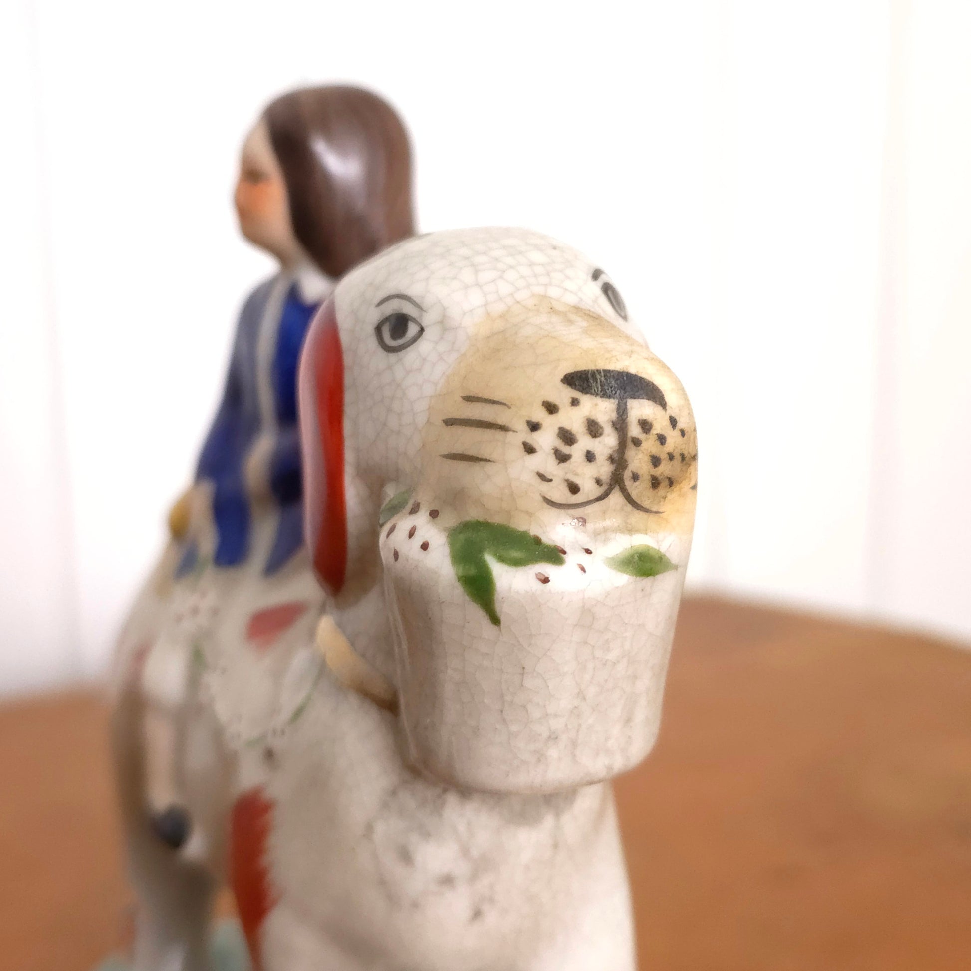 Dog detail of Staffordshire Porcelain Prince and Princess Dog Statues