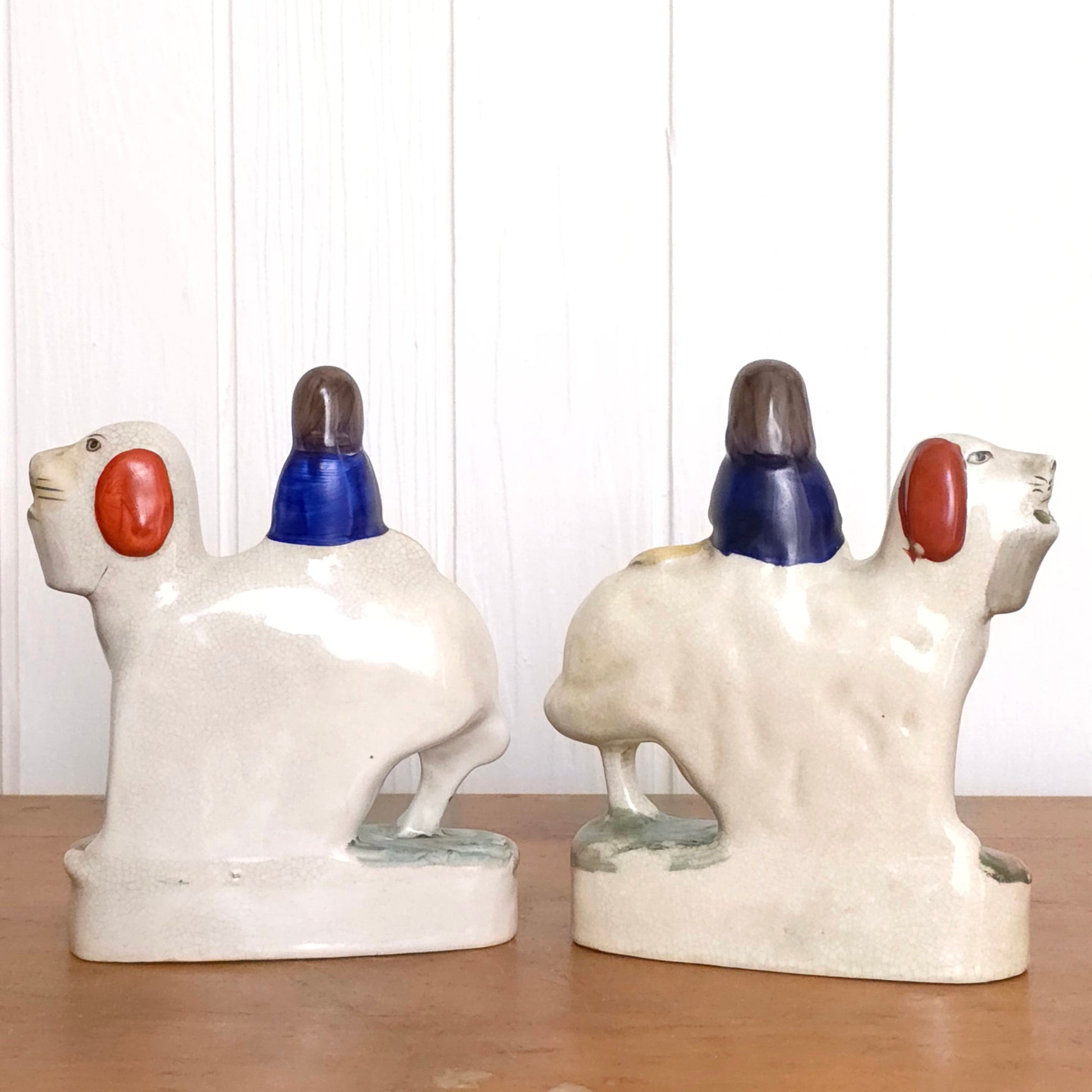 Back view of Staffordshire Porcelain Prince and Princess Dog Statues